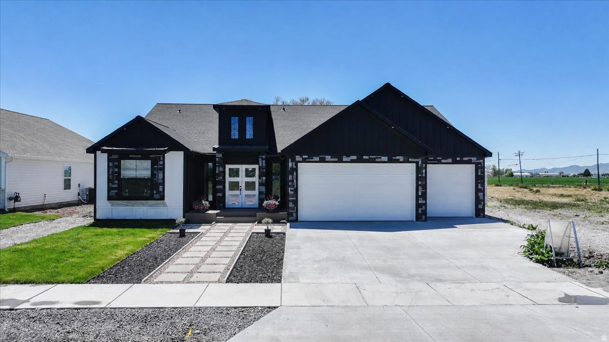 PRICE REDUCED! Welcome to this beautifully newly built home in the heart of Preston! Featuring 3 spacious bedrooms, 2.5 bathrooms, and a 3-car garage, this home offers the perfect blend of modern comfort and functional design. Step inside to find an open-concept layout with bright living spaces, quality finishes, and plenty of room for entertaining or everyday living. The kitchen flows seamlessly into the dining and living areas, creating a warm and inviting atmosphere. The primary suite offers a private retreat with an ensuite bathroom and generous closet space .The highlight is relaxing in the home sauna. The loft is a fun extra space. The 12 ft accordion door leading to the outdoor kitchen can open up the whole kitchen for entertaining.  Enjoy the convenience of a large  finished garage with extra storage and room for toys.   Square footage figures are provided as a courtesy estimate only and were obtained from ___county records___________ .  Buyer is advised to obtain an independent measurement.