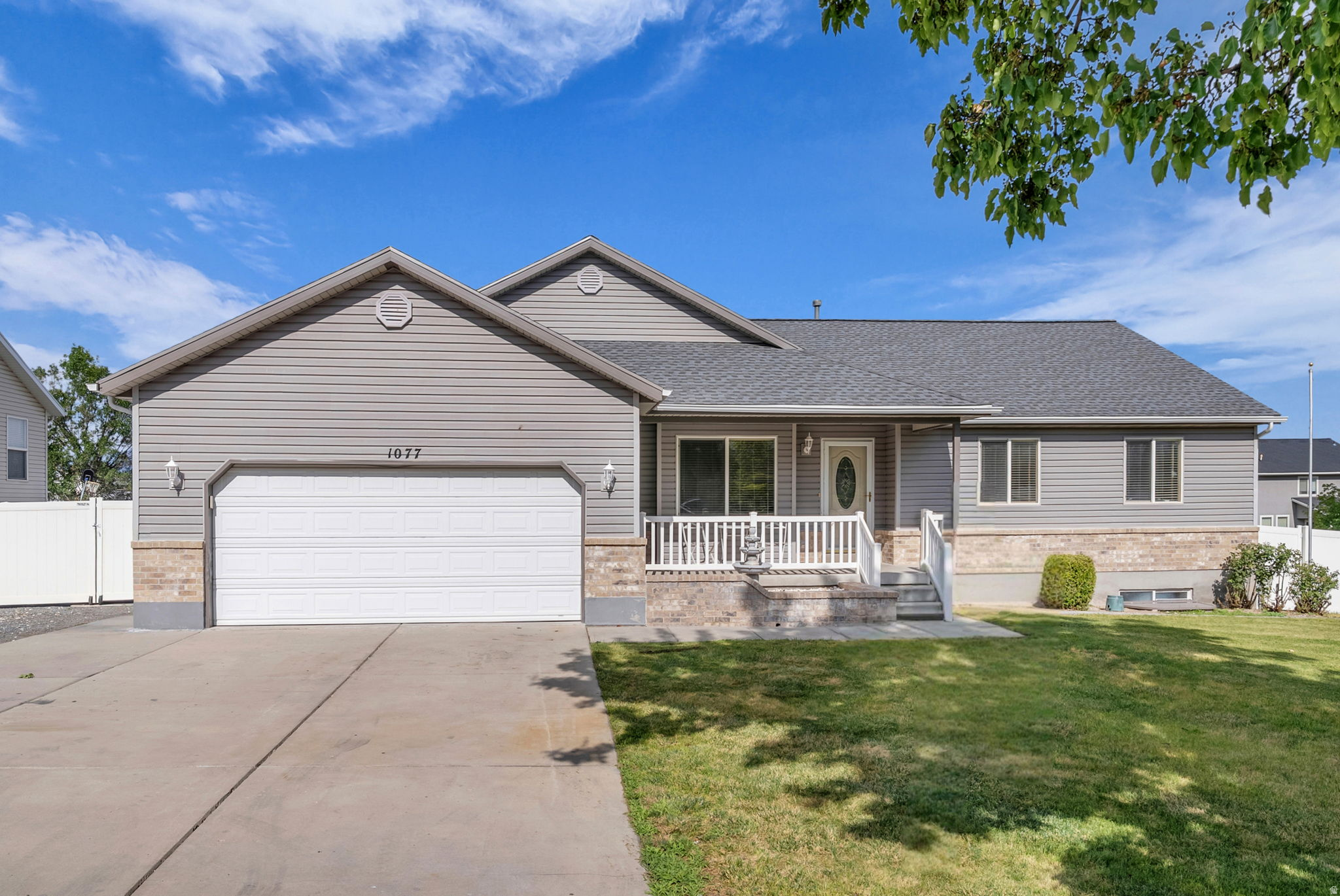 Beautifully updated and move-in ready! This spacious home features new carpet, fresh paint, updated lighting,  vaulted ceilings, and a finished basement. The large sunroom with built-in BBQ and dry bar make this home perfect for entertaining. Situated on an oversized corner lot in a quiet neighborhood with no backyard neighbors, offering exceptional privacy and outdoor space.