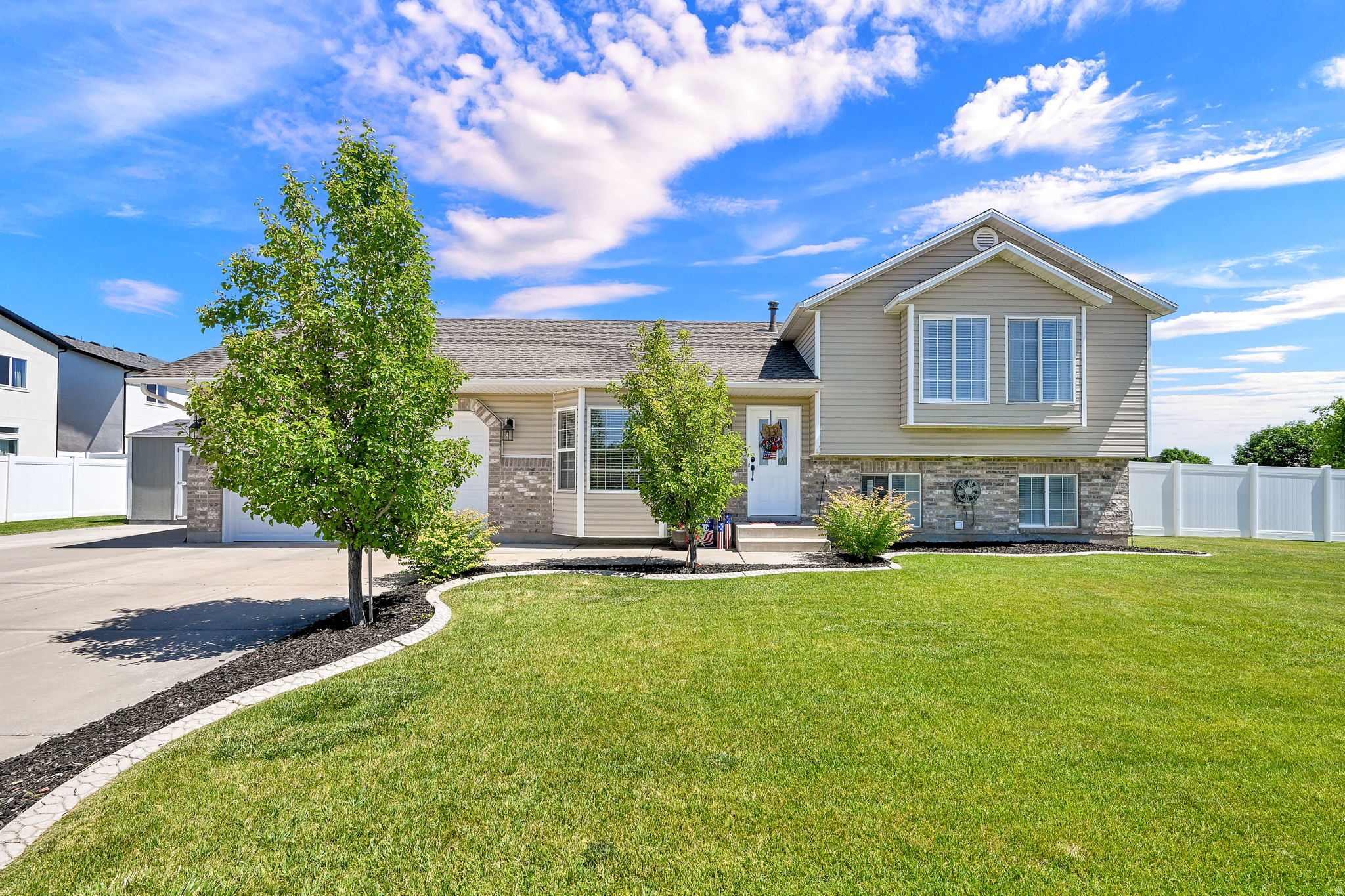 *OPEN HOUSE SAT 06/13 FROM 11-2* Beautifully updated 4-bedroom, 2.5-bath home in a desirable Roy neighborhood! This move-in-ready property features new luxury vinyl plank (LVP) flooring throughout. The kitchen is equipped with stainless steel appliances, while major system updates provide peace of mind, including a new roof installed in 2018 and a new furnace and central A/C replaced in 2026. Additional upgrades include newly replaced garage doors and a WiFi-compatible garage door opener. The garage also features a convenient utility sink, ideal for projects, cleanup, or gardening. Step outside to enjoy the built-in fire pit, fully fenced backyard and a large concrete RV pad for extra parking or toys & large shed. Conveniently located near schools, shopping, parks, and everyday amenities. Don't miss the opportunity to own this well-maintained, updated home in a great location!