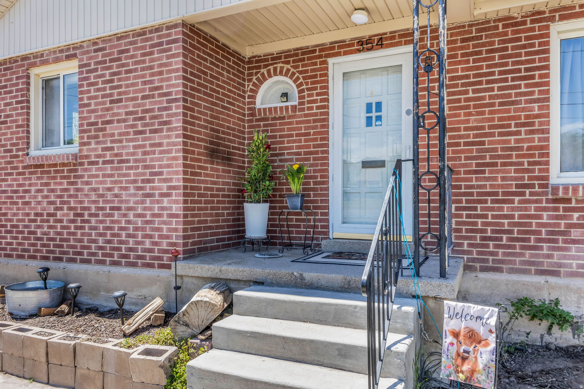 Remodeled Brick Home w/ Single Level Living ADU. Square footage shown on 2nd floor is representing the ADU. This property offers rental income and extra room for family and guests. Large kitchen big enough to add a butcher block island or breakfast table. Living/dining space is bright and inviting with large windows and room for your big comfy sectional and large dining table. Updates done over the last 3 years: Front home: range hood, bathtub surround, vanity, tile. New carpet (2026) over hardwood, paint, furnace, a/c, electrical upgrade. ADU was completely remodeled in 2022.  Utility connection 220 V  for shed, electric car charging and water. Square footage figures are provided as a courtesy estimate only and were obtained from Tooele county records. Buyer is advised to obtain an independent measurement.
