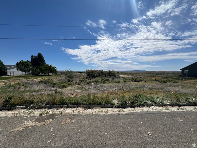 Build your dream home on this spacious 0.98-acre lot located in one of Huntington's desirable residential neighborhoods. Situated on a quiet street, the Huntington lot encompasses the peaceful small-town atmosphere. With plenty of room for a custom home, shop, outdoor living space, and more. Enjoy the convenience of being within walking distance to a local park while still having the privacy and space that larger lots provide. Whether you're ready to build now or invest for the future, this is an excellent opportunity to own nearly an acre in a great location with beautiful surroundings and endless potential. With homes in the neighborhood, already built, utilities are easily accessible - saving you thousands on your new build. (PHYSICAL ADDRESS IS NEAR 250 S 400 E in Huntington). Buyer to verify utilties.