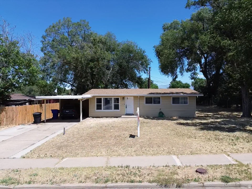 Welcome home to this charming single level home.   Conveniently located close to HAFB and shopping this home is tucked away in a very nice spot.   The yard is large and mostly fenced and there are two storage sheds as well as a carport and patio.   You will love the open layout concept and the storage this home has.   There are three bedrooms and lots of living space.   Recent improvements include flooring, paint and a new furnace!  Make your appointment today to see this home!