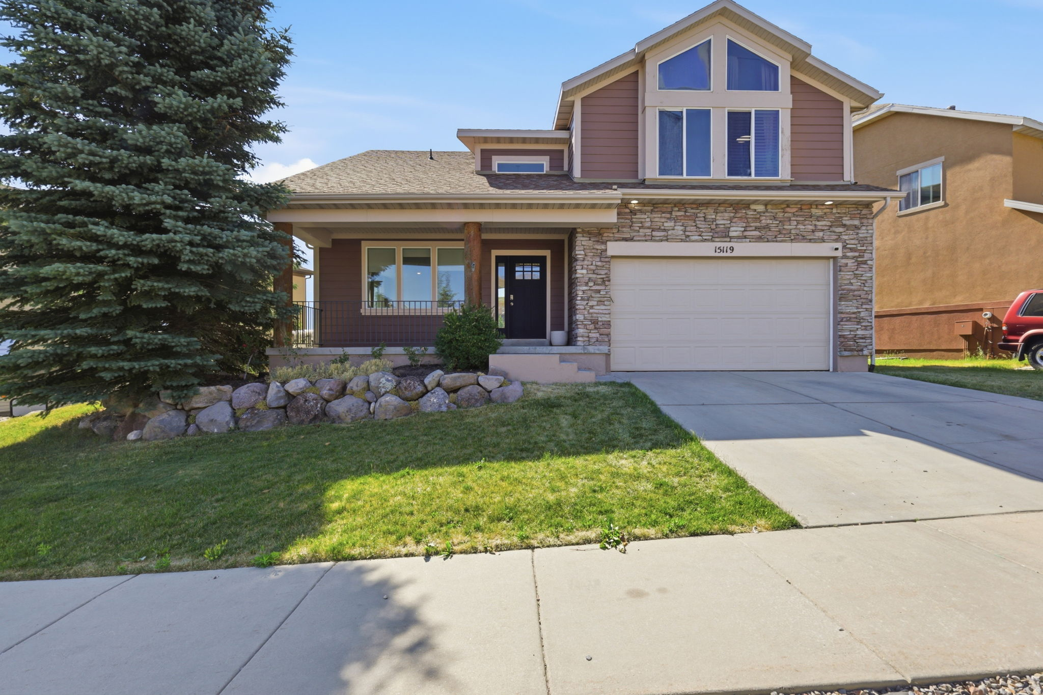 Enjoy breathtaking mountain views from this beautiful Draper home in the highly sought-after Suncrest community. Featuring 5 bedrooms, 3.5 bathrooms and a loft perfect for a home office, this home offers an open and inviting floor plan designed for comfortable living and entertaining. The oversized primary suite includes a bay window perfectly positioned to capture the stunning scenery, along with a walk-in closet and private ensuite bathroom with a separate tub and shower. The newly updated gourmet kitchen showcases stainless steel appliances, Corian countertops, and abundant cabinet space. Vaulted ceilings and expansive windows fill the great room with natural light, creating a bright and welcoming atmosphere throughout the home. Recent updates include fresh paint, new baseboards, ceramic tile flooring and LVP on the main level and basement. The fully finished basement provides additional living and entertaining space, while the included solar system helps reduce energy costs. Outside, you'll find a fully fenced backyard featuring a spacious deck and a dedicated play area, making it the perfect place to relax, entertain, or enjoy family time. Suncrest residents enjoy exceptional HOA amenities, including a community pool, clubhouse, fitness center, basketball court, and miles of hiking and biking trails. Located above the valley inversion and often above the clouds, this mountain community offers a Park City feel while remaining just minutes from world-class golf, Silicon Slopes, shopping, dining, and entertainment. Sq Ft per county records