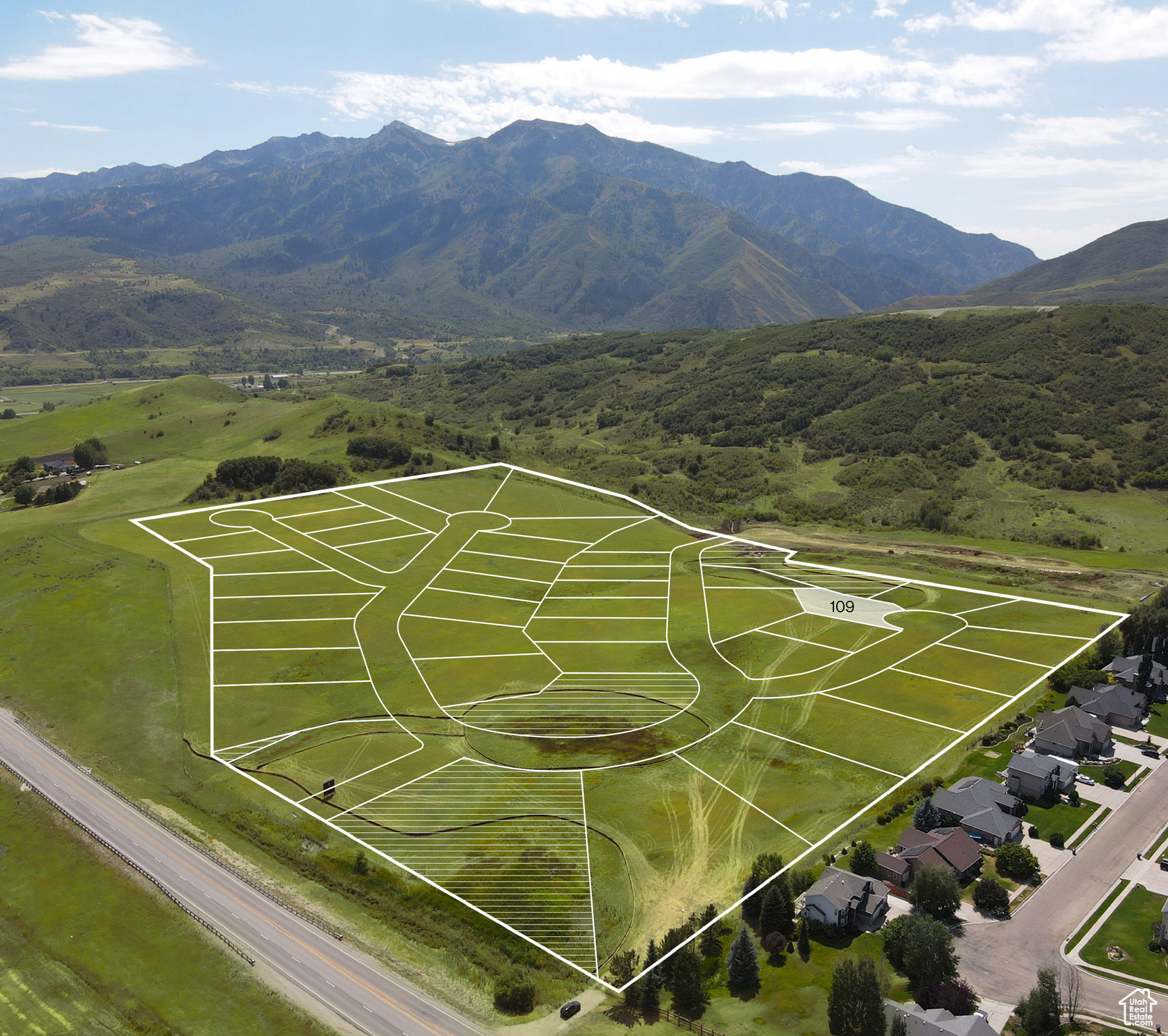 Build your mountain dream home at The Range in Mountain Green. Lot 109 is a 0.51-acre estate lot, offering privacy, space, and stunning views in one of Utah's most sought-after mountain communities. Located just minutes from Snowbasin Resort and Pineview Reservoir, The Range combines the beauty of the Wasatch mountains with convenient access to year-round recreation. Choose from four perfectly curated pre-designed home plans by our in-house design team, or create a fully custom residence that complements the natural surroundings. Utilities-including culinary water, sewer, power, gas, and fiber internet-are stubbed to the lot, and HOA services include open-space preservation, landscaping maintenance, and snow removal. With generous lots, thoughtful design standards, and a location less than an hour from Salt Lake City, The Range is the ideal place to build your forever home.