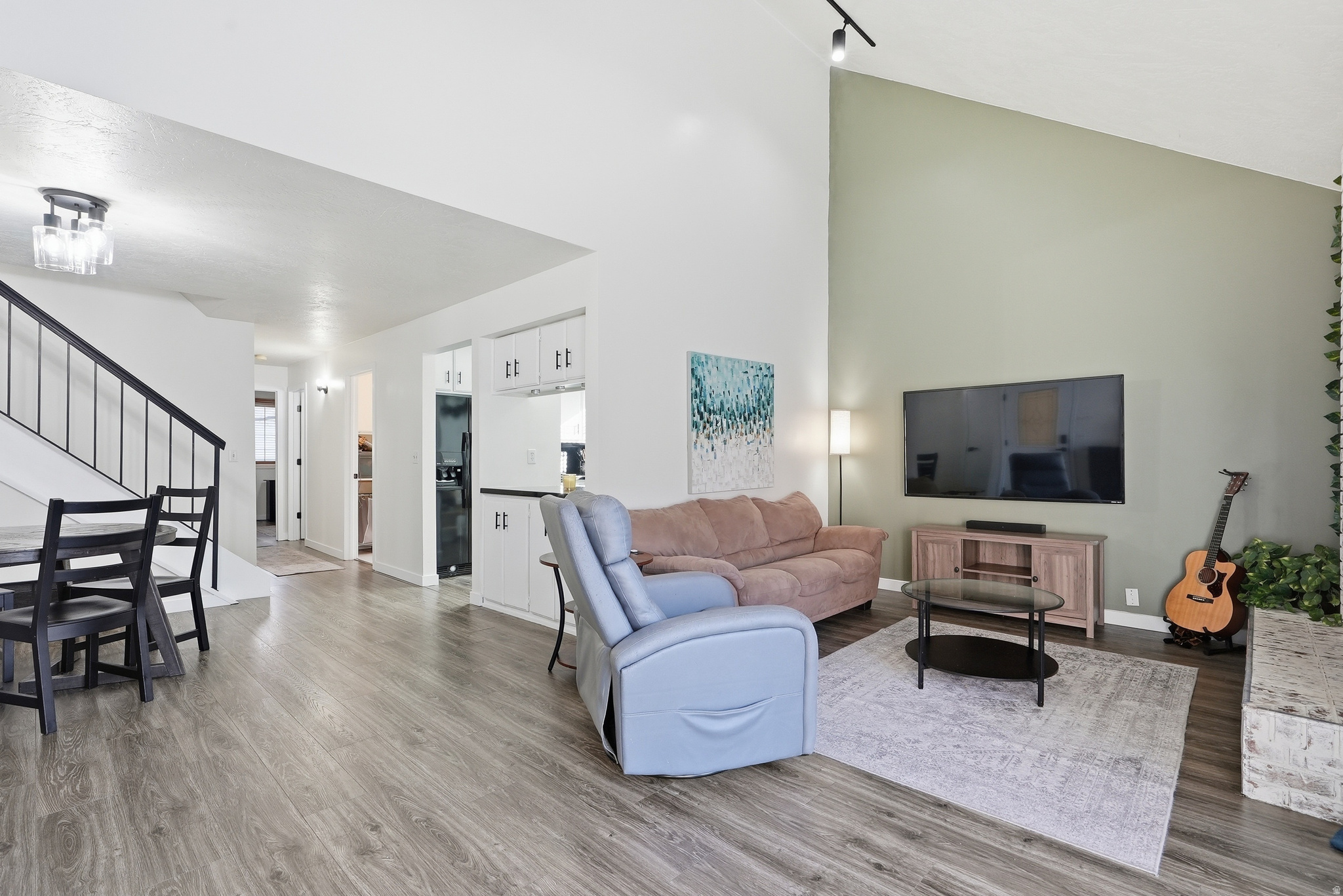 ** This home was featured on "Utah's Real Estate Essentials" as seen on ABC4, HULU + Live TV & Telemundo Utah!  Your opportunity to own a beautifully updated, move in ready top level condominium is here! From the moment you step inside, you'll be impressed by the spacious layout, thoughtful design, and stylish upgrades throughout, perfect for both relaxing and entertaining.  This home has been tastefully renovated with upgrades including fresh interior paint, new flooring throughout (including stairs), updated trim, new main floor doors, and a refreshed downstairs fireplace. The kitchen has been enhanced with a stainless steel sink and added dishwasher for convenience.  Upstairs, the enclosed loft creates a versatile space featuring a custom media wall, electric fireplace, cabinetry, and floating shelves, ideal for a second living area, office, or cozy retreat. Enjoy a wide range of community amenities including a pool, volleyball, tennis and basketball courts, parks, clubhouse, and picnic areas.  Conveniently located just minutes from Fort Union's shopping, dining, and entertainment, as well as world-class skiing, hiking, lakes, and nearby medical services, with easy access to I-215 and I-15.This home offers the perfect blend of comfort, style, and location.