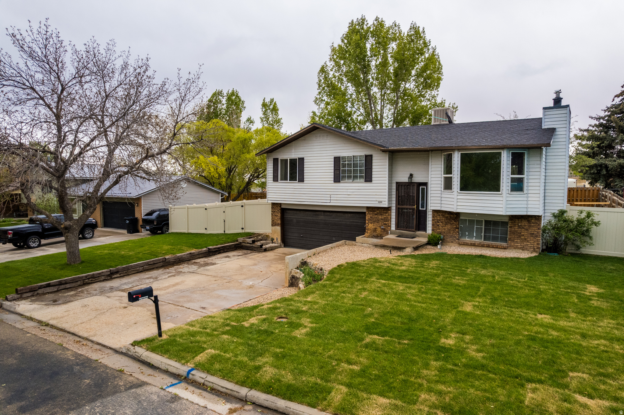 Charming Home in Cottonwood Heights Subdivision  3-bedroom, 2-bathroom home. Built in 1982, this spacious 1,626 sq. ft. residence offers the perfect blend of comfort and potential. Brand new, fully landscaped yard, and new deck, ideal for outdoor entertaining!   While this home is priced to sell and ready for your personal touch, it does require some TLC to unlock its full potential. Don't miss this fantastic opportunity to make this charming house your dream home! Schedule a showing today! Square footage figures are provided as a courtesy estimate only and were obtained from County Records.  Buyer is advised to obtain an independent measurement.