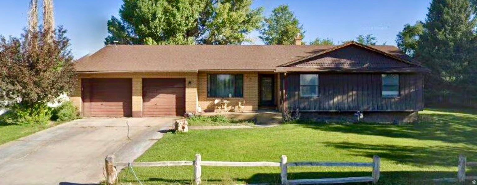 Enjoy country living with the convenience of being just minutes from town. This single-level home sits on a spacious lot and offers 3 bedrooms, 2 bathrooms, and a versatile den perfect for a home office, playroom, or additional living space. The living room, kitchen and foyer feature beautiful hardwood floors, creating a warm and inviting atmosphere. Outside, large mature trees provide abundant shade and privacy. The property also includes a well for pressurized secondary water, adding convenience and potential savings for outdoor watering needs. A great opportunity to enjoy space, comfort, and rural charm without sacrificing access to nearby amenities. Square footage figures are provided as a courtesy estimate only and were obtained from county.