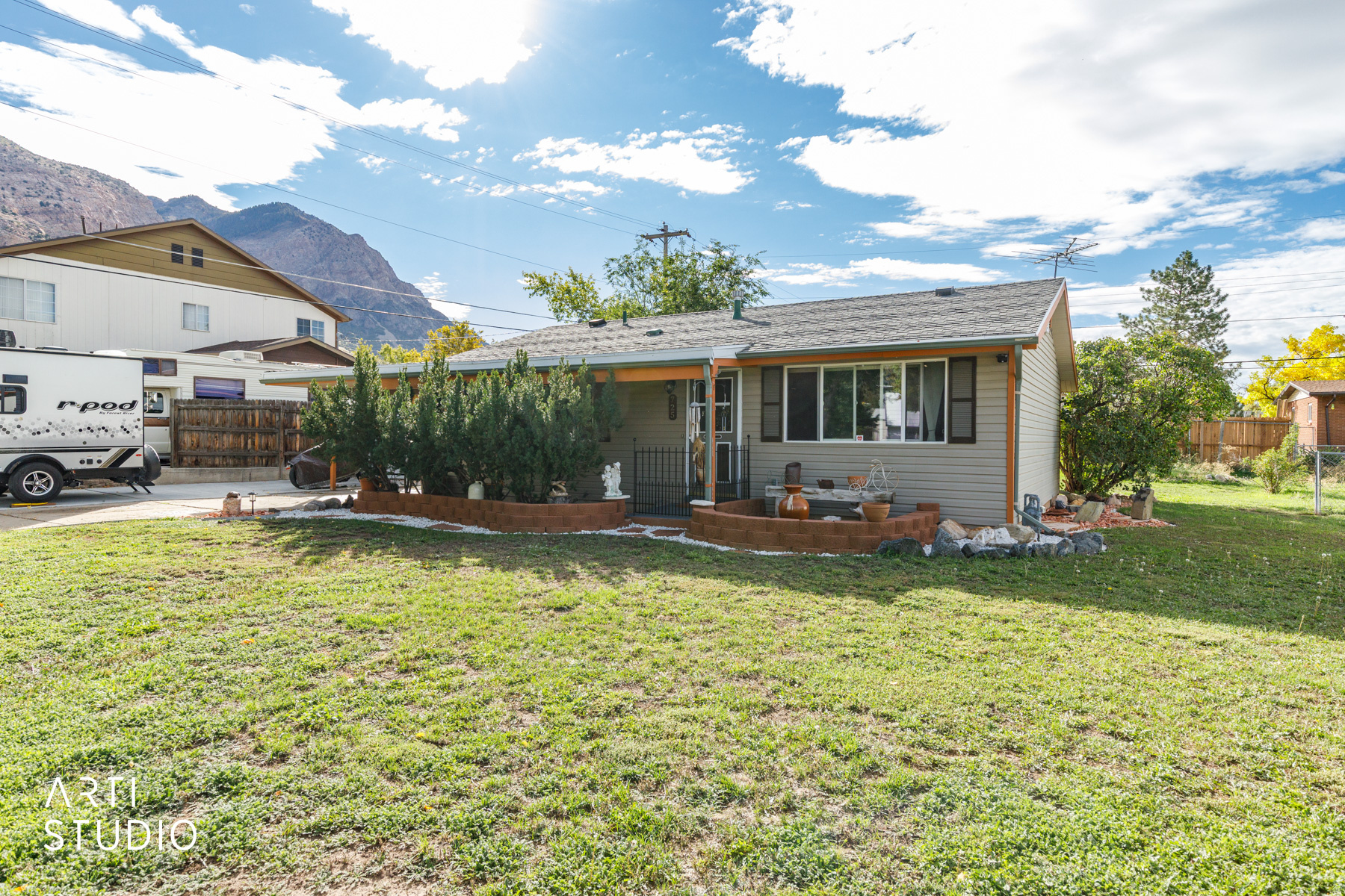 Suburban home with a distinctive mountain-inspired vibe, featuring driftwood accents and a flowing, open floorplan. Located near trail systems, it makes outdoor adventures easy to enjoy. The inviting outdoor living spaces bring nature right to your doorstep, so you can savor the beauty of the outdoors without leaving home.