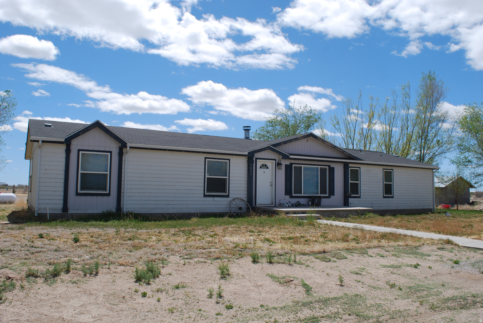 Great home with animal rights!  Open floor plan.  Great for gatherings with living room & two family rooms!  Almost all updated within the last 5 years.  Central air less than 1 year old.  Additional land available, if desired for over 10 acres (see mls #2153309).  Blinds included. Draperies are excluded.  Well on property will be sold with 1.0 acre feet water.  Property zoned residential, commercial or agricultural.  Please try to give 24 hr notice to show to schedule work & dogs.