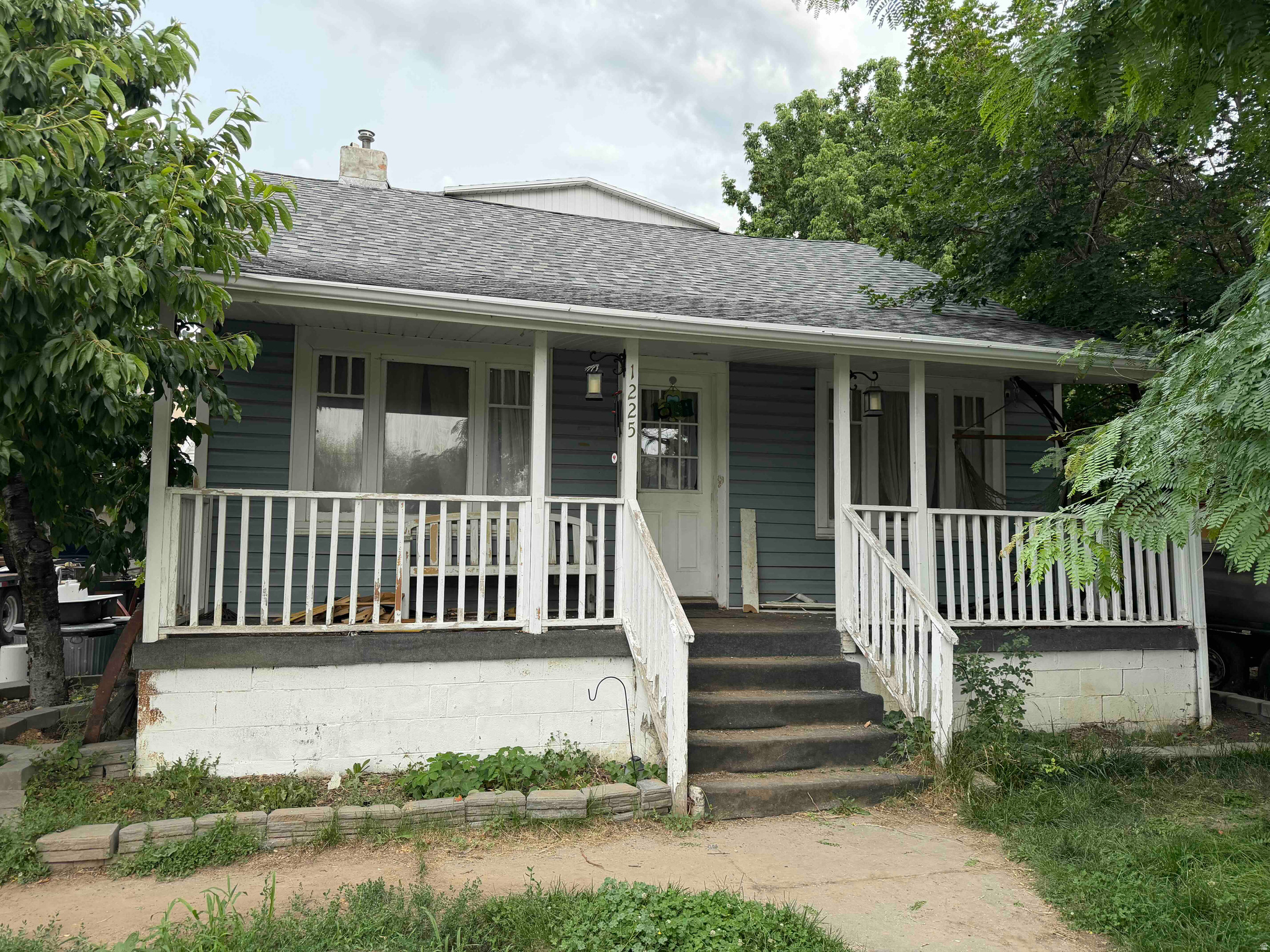 Investor Special - This property offers a roof that was replaced in November 2021, central AC and a large detached garage-workshop (2021) that features a 12" slab foundation, welding-ready equipment and an unfinished studio loft upstairs. Also offered is a large RV parking area for several vehicles, furnished with RV electrical hookups. - Square-footage estimates and other info provided as a courtesy; Buyer/Agent to verify all information.