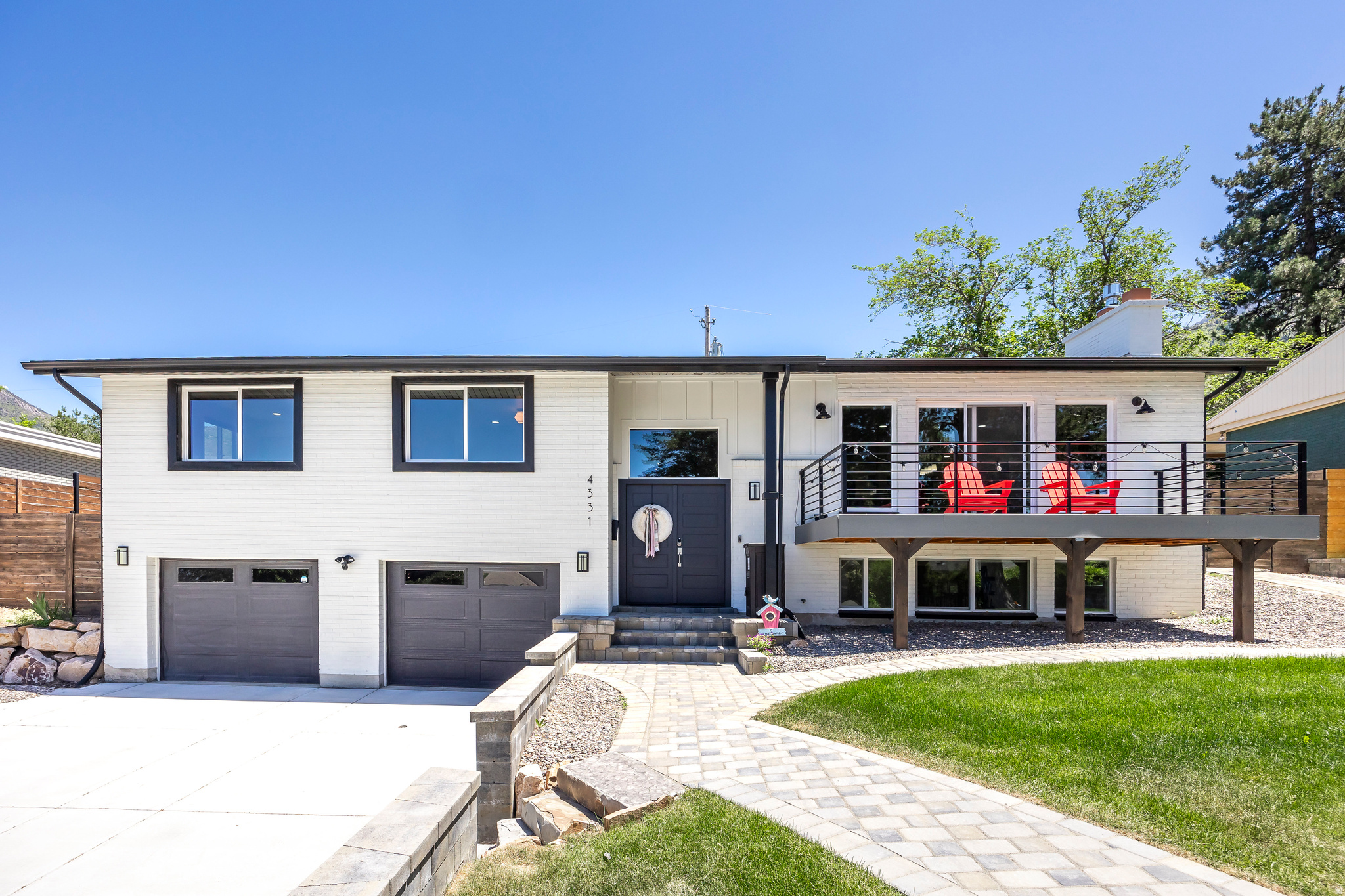 Welcome to 4331 Fortuna Way, a beautifully maintained 4-bedroom, 3-bathroom home nestled in a serene neighborhood of Salt Lake City. This spacious 2,500 sq. ft. residence offers the perfect blend of comfort, style, and convenience, making it an ideal place for your family to create lasting memories. Step into the inviting living room featuring ample natural light and a cozy fireplace, perfect for gatherings and relaxation. The well-appointed kitchen boasts modern appliances, ample cabinetry, and a convenient breakfast bar with fully updated custom bar stools, making meal preparation a delight. Retreat to the luxurious master suite with a private en-suite bathroom. Three additional generously-sized bedrooms provide plenty of space for family, guests, or a home office, while three full bathrooms ensure comfort and convenience for everyone. Enjoy outdoor living in the beautifully landscaped backyard, featuring new landscaping, a patio area perfect for barbecues and outdoor entertaining, and a Traeger smoker for the ultimate grilling experience. Street-facing windows are equipped with privacy features, ensuring peace and comfort within your home. The property includes ample storage options and a spacious garage for secure parking and additional storage needs. This property is available unfurnished and the furniture in the photos is not included.  PETS: A well-behaved pet under 25 pounds is negotiable with owner approval and a $500 pet deposit.  No smoking. First and last month's rent, as well as a $3,800 security deposit, are required prior to moving in. Available for a 12 month lease.  UTILITIES: As part of the rental obligations, the resident will be responsible to pay: electricity, gas, water, sewer, trash, lawn care, phone, internet, and cable TV/satellite. The resident is also responsible for removing snow from the driveway, walking surfaces, and porch, as well as replacing air and water filters. The resident is required to have an active Renter's Insurance Policy during the duration of the lease.  NEIGHBORHOOD: Located in a peaceful neighborhood with easy access to major highways, this home ensures a quick commute to downtown Salt Lake City and surrounding areas. With close proximity to shopping centers, and dining options, it offers a lifestyle of convenience and leisure.
