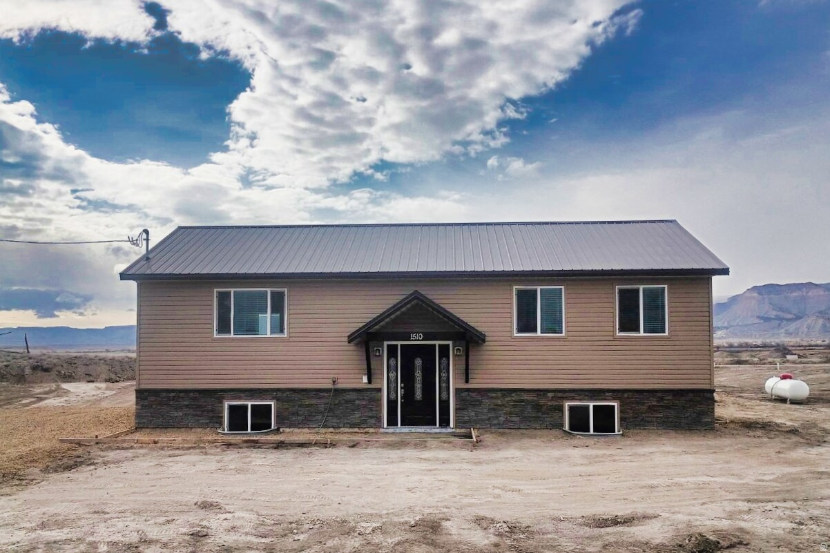 New Construction!! Welcome to this inviting 3-bedroom, 1-bath home with large living room/kitchen area as well as a full unfinished Basement. It is situated on a spacious 2-acre lot, offering the perfect blend of comfort, privacy, and potential. Whether you're looking for peaceful country living or room to grow, this property delivers. You can also bring your animals as it is in ag zoning. Inside the home you'll find a functional layout with comfortable living spaces and plenty of natural light. The three bedrooms and full bath provide practical living for families while the basement has endless possibilities of being used for storage, Future game/theater, home gym, or additional bedrooms.