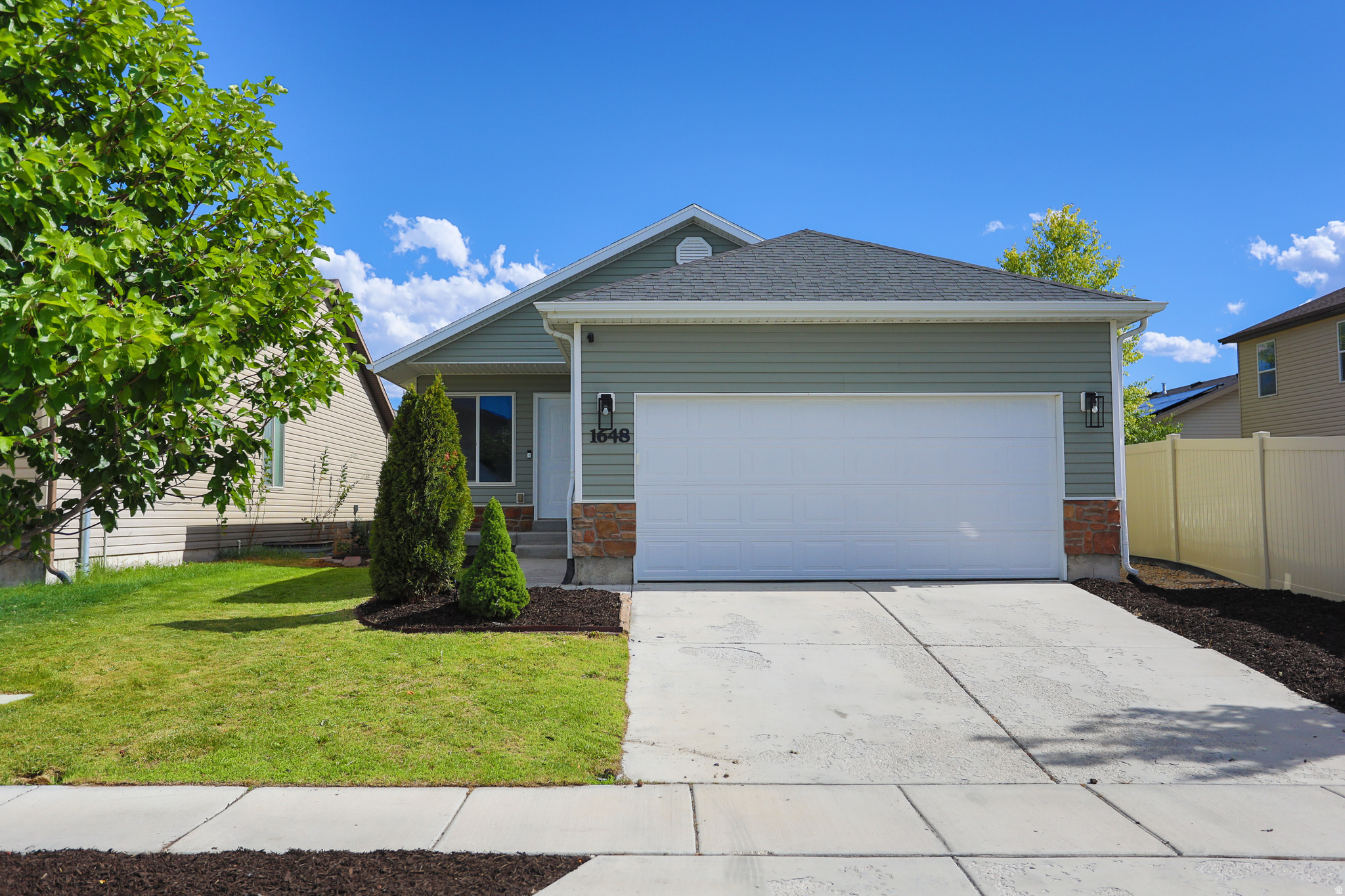 Located in a beautiful Eagle Mountain neighborhood, this beautifully updated home combines modern finishes, comfort, and convenience. Fresh interior paint, brand-new plush carpet, and stylish luxury vinyl plank flooring create a bright, welcoming atmosphere throughout. The kitchen is designed to impress with stainless steel appliances, gorgeous countertops, and ample workspace for cooking and entertaining. Updated bathrooms feature upgraded finishes that add a touch of everyday luxury. Outside, enjoy the benefits of being adjacent to a park while maintaining quick access to shopping, dining, schools, and freeway connections. Exceptionally clean and truly move-in ready, this home offers the ideal combination of location, style, and value. Schedule your showing today!