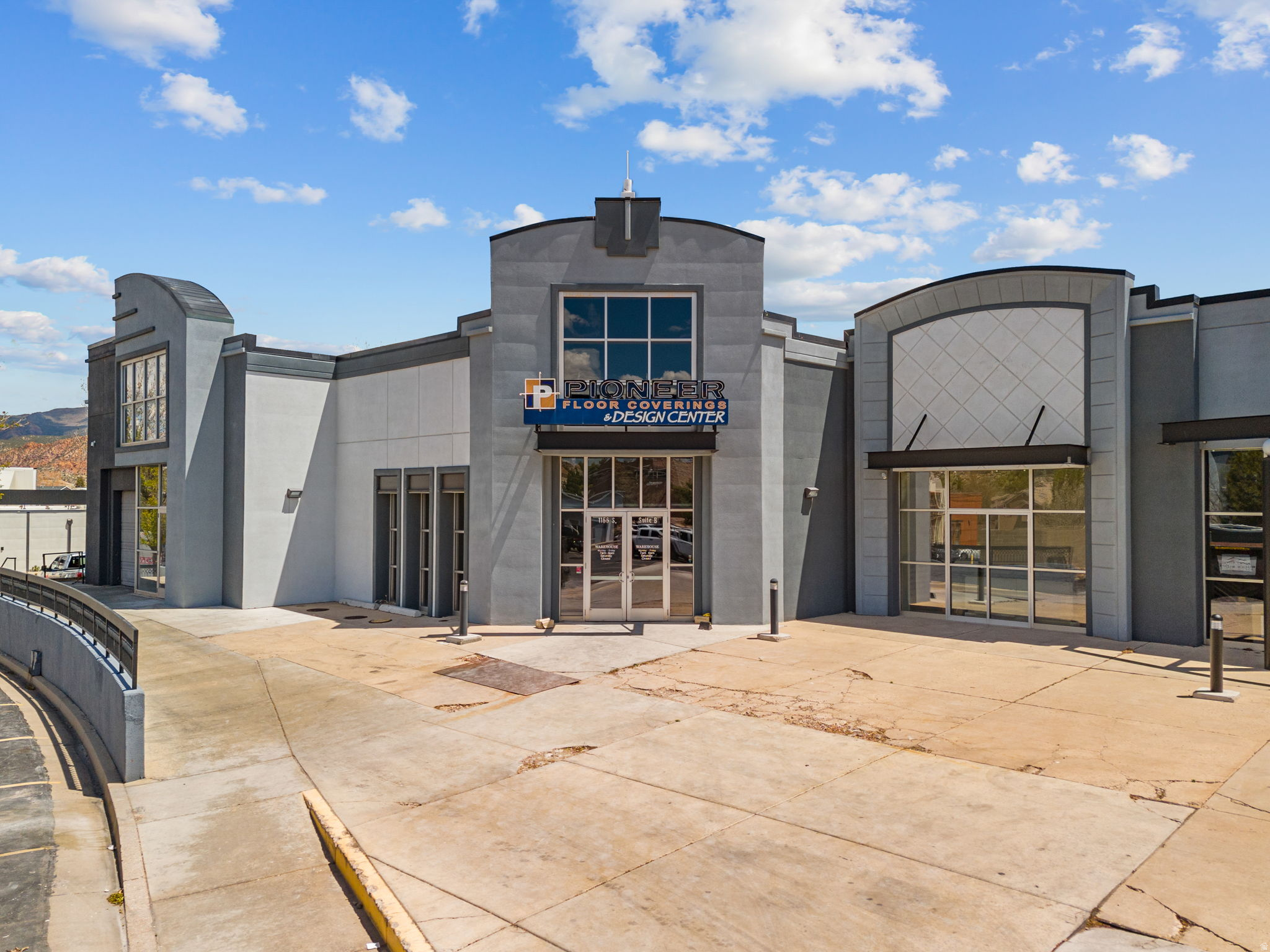Prime commercial lease opportunity within Pioneer Plaza offering 6,404 SF of flexible space with excellent I-15 visibility and close proximity to the freeway exit. Offered at $2.00 per square foot. Centrally located in the heart of town, this property is ideal for a variety of commercial uses. Features include a showroom area, one shipping dock, and the ability to add a wall for customized configurations if needed. Offered as a Triple Net (NNN) lease, this space provides excellent accessibility, exposure, and long-term business potential. Great opportunity for an anchor business seeking a high-traffic location with strong visibility. CAM Fees include tax, snow removal, parking lot, ext maintenance.