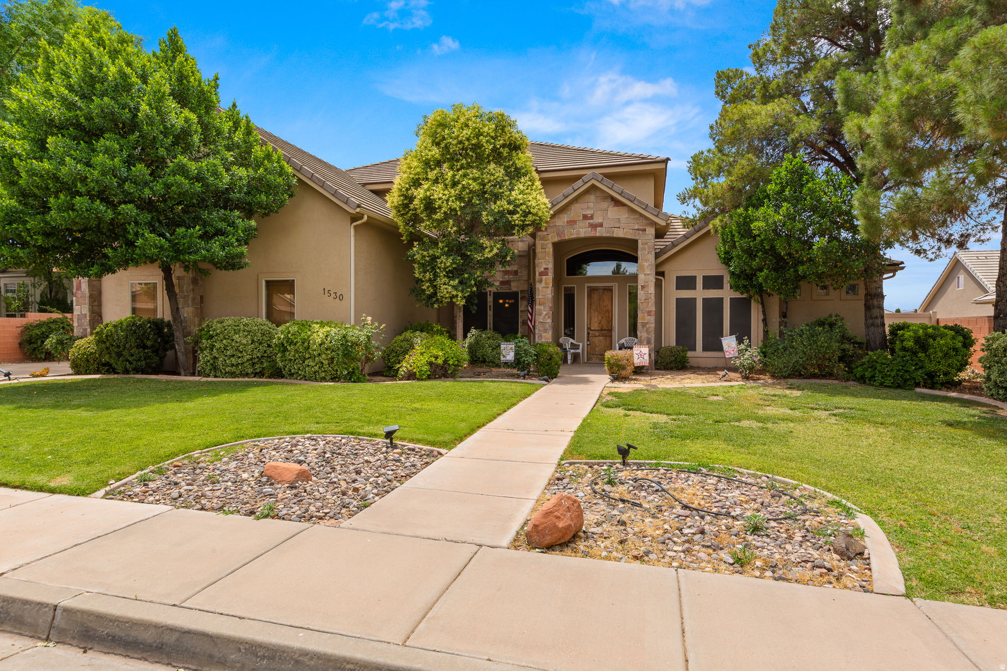 Comfort meets timeless charm in this beautiful home featuring a sparkling pool and relaxing hot tub, perfect for enjoying every season. Inside, you'll find expansive windows that fill the home with natural light, hard surface flooring throughout the main living areas, and a cozy fireplace that creates a warm and inviting atmosphere. Step outside to a beautifully landscaped yard surrounded by mature trees, offering both shade and privacy while creating the perfect setting for entertaining or unwinding at home. A rare combination of comfort, character, and outdoor beauty all in one inviting property. **Estate sales will be happening on the following days: Friday 5/29 and Saturday 5/30 8 a.m. to 2 p.m. Thursday 6/4/26 5 p.m.- 8p.m. Friday 6/5 and Saturday 6/6 8 a.m. to 2 p.m.