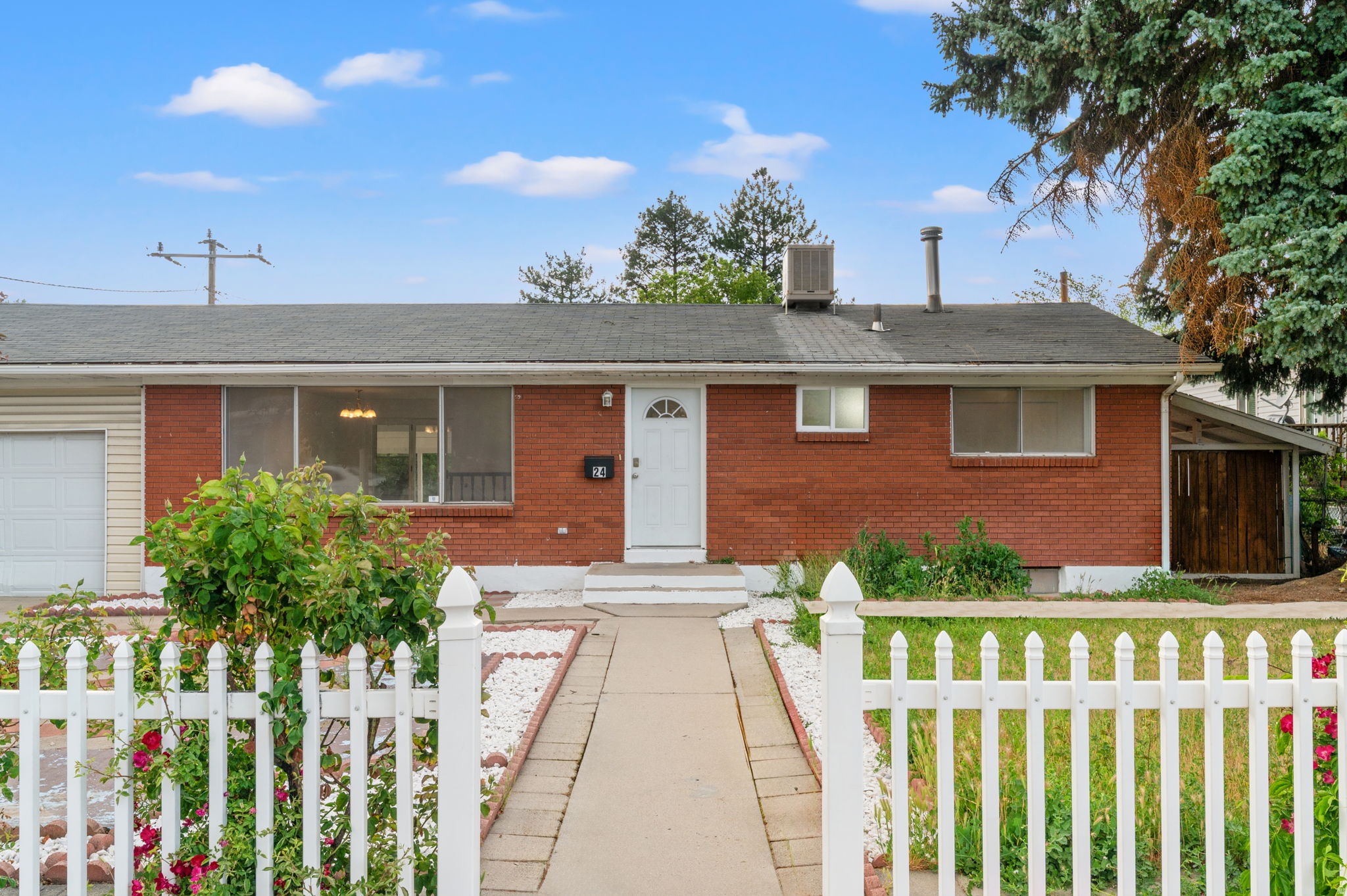 Charming Rambler in Prime Orem Location with NO HOA! Welcome to this wonderful 2,016 sq. ft. single-family residence located at 24 SE 800 E. Built in 1959, this classic single-level home features 4 bedrooms and 2 full bathrooms, with a functional layout spanning 1,008 sq. ft. on the main level and a 100% finished full basement providing an additional 1,008 sq. ft..  Inside, you will find a bright family room, A beautiful large window view of the mountains, a formal living room, carpet and tile flooring, and a brand new kitchen. Comfort is maintained year-round with forced air gas heating and a swamp cooler.  Situated on a 0.188-acre lot with east-facing frontage, the exterior offers partial landscaping, a fenced yard, concrete driveway, storage shed, and a 1-car carport. Nestled within the Alpine School District, students are zoned for Centennial Elementary, Canyon View Junior High, and Orem High School. Best of all, there are no HOA fees.  Square footage figures are provided as courtesy estimates only and were obtained from county records. Buyer is advised to obtain an independent measurement.