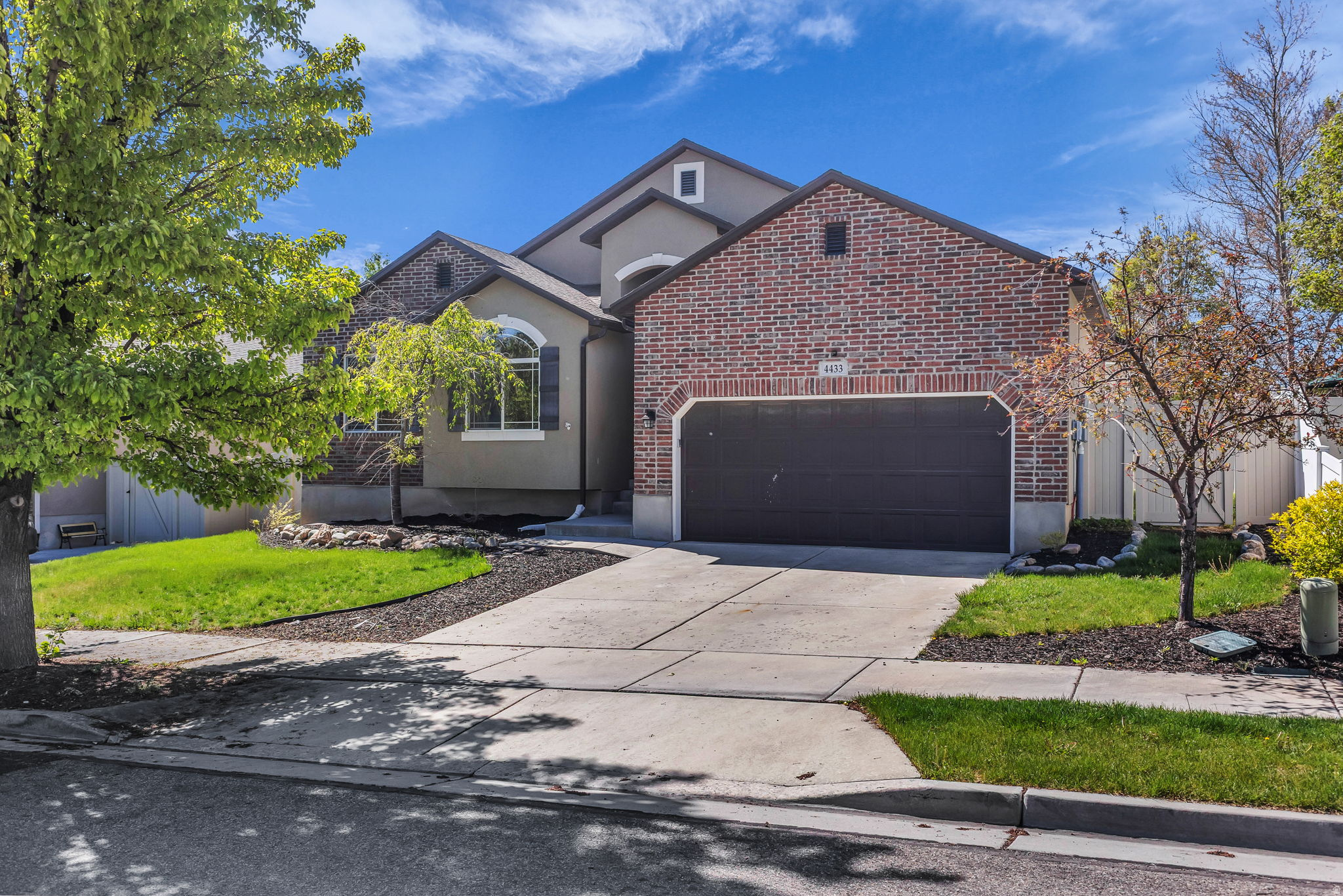 Welcome home to this bright and inviting 5-bedroom, 3-bathroom rambler, perfectly situated in a quiet, friendly Riverton neighborhood. Boasting 2,900 sq. ft. of meticulously updated living space, this home feels brand new from the moment you step inside.  The main floor features an open-concept layout with vaulted ceilings, fresh flooring, and a chef-inspired kitchen complete with brand-new cabinets and stainless steel appliances. Retreat to the spacious primary suite or enjoy the convenience of main-floor laundry. The newly finished basement offers a massive second family room, two additional bedrooms, and a stylish new bathroom-ideal for a theater room, gym, or guest suite.  Step outside to a fully fenced, private backyard with mature trees and a patio perfect for summer BBQs. Located just minutes from Mountain View Village, The District, and top-rated Jordan District schools, this home offers the perfect blend of suburban peace and urban convenience.  Buyer/buyer's agent to verify all listing info.  Square footage figures are provided as a courtesy estimate only and were obtained from county records.  Buyer is advised to obtain an independent measurement.