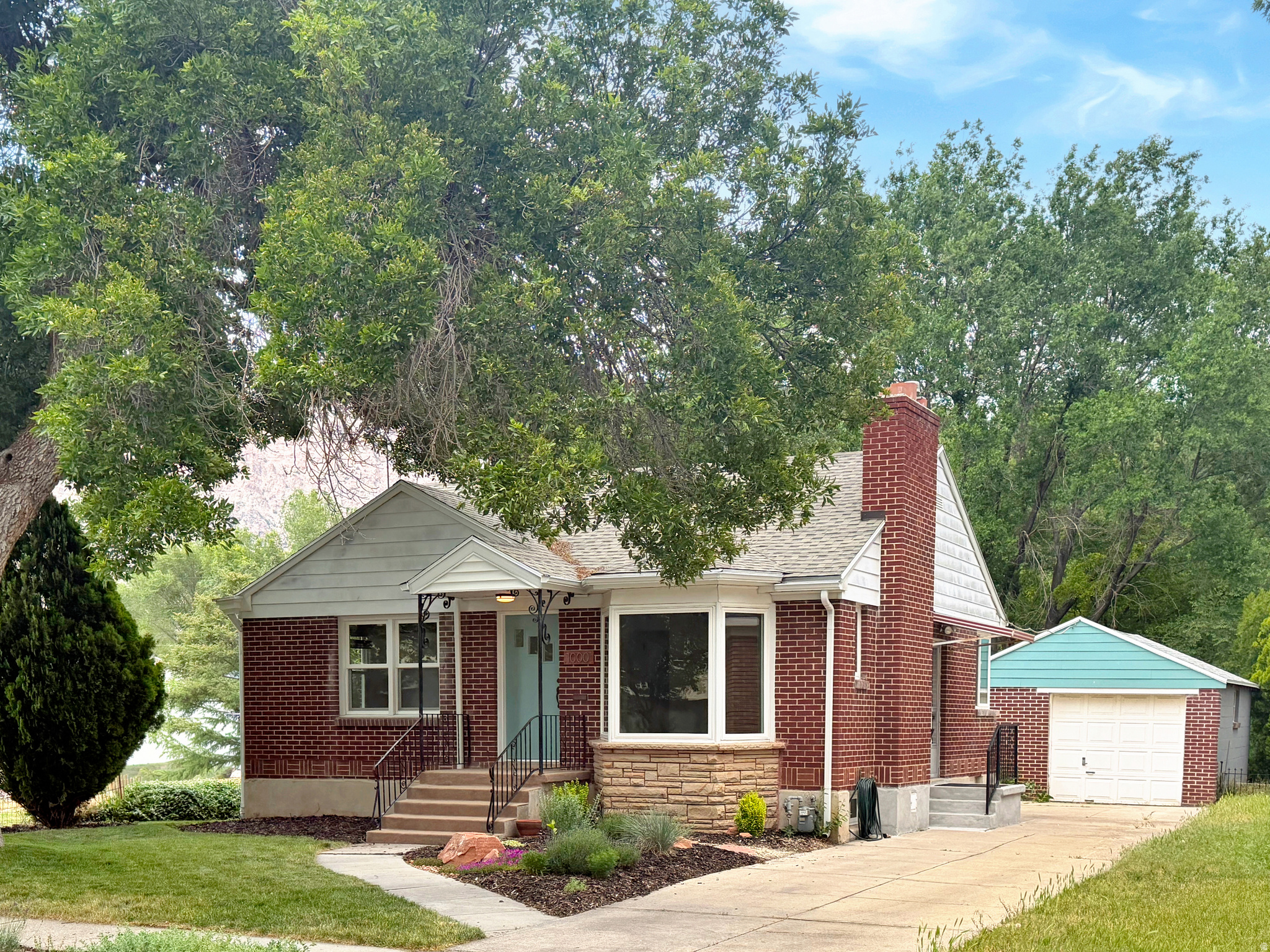 Located in the heart of Ogden, this charming home offers the perfect balance of convenience and tranquility, while being just minutes from downtown Ogden and Ogden Canyon. The expansive backyard is filled with mature fruit trees and grapevines, creating a beautiful outdoor retreat with plenty of space for gardening, entertaining, or simply relaxing. Prepaid irrigation shares add even more value and convenience. Out front, the thoughtfully updated drought-tolerant landscaping offers vibrant color all season long, while supporting low-maintenance living. Major updates include all new energy-efficient windows installed in 2022, a new roof and gutters completed in spring 2023 and a brand-new water heater installed in May 2026. Schedule a showing today.