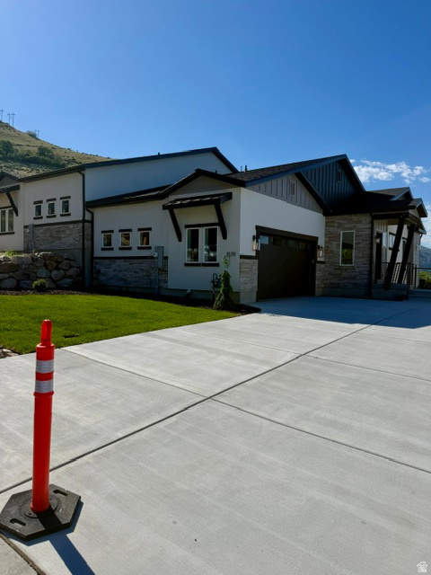 Welcome to your dream home in the new Valley View subdivision nestled on Ogden's picturesque east bench, offering the perfect blend of modern luxury and outdoor adventure. Our rambler plan features vaulted ceilings, upgrades galore, and is custom built to boast breathtaking panoramic views and provide direct access to scenic hiking trails, inviting you to embrace the beauty of nature right outside your doorstep. Views everywhere you look! The sleek kitchen is a chef's delight, equipped with premium appliances, stylish cabinetry and ample counter space flowing into the main great room with tons of natural light. Walkout basement with 2nd fireplace. Absolutely must see. Scheduled completion, June 2025. Ask about special lender incentives! *Staged photos are of a comparable build*