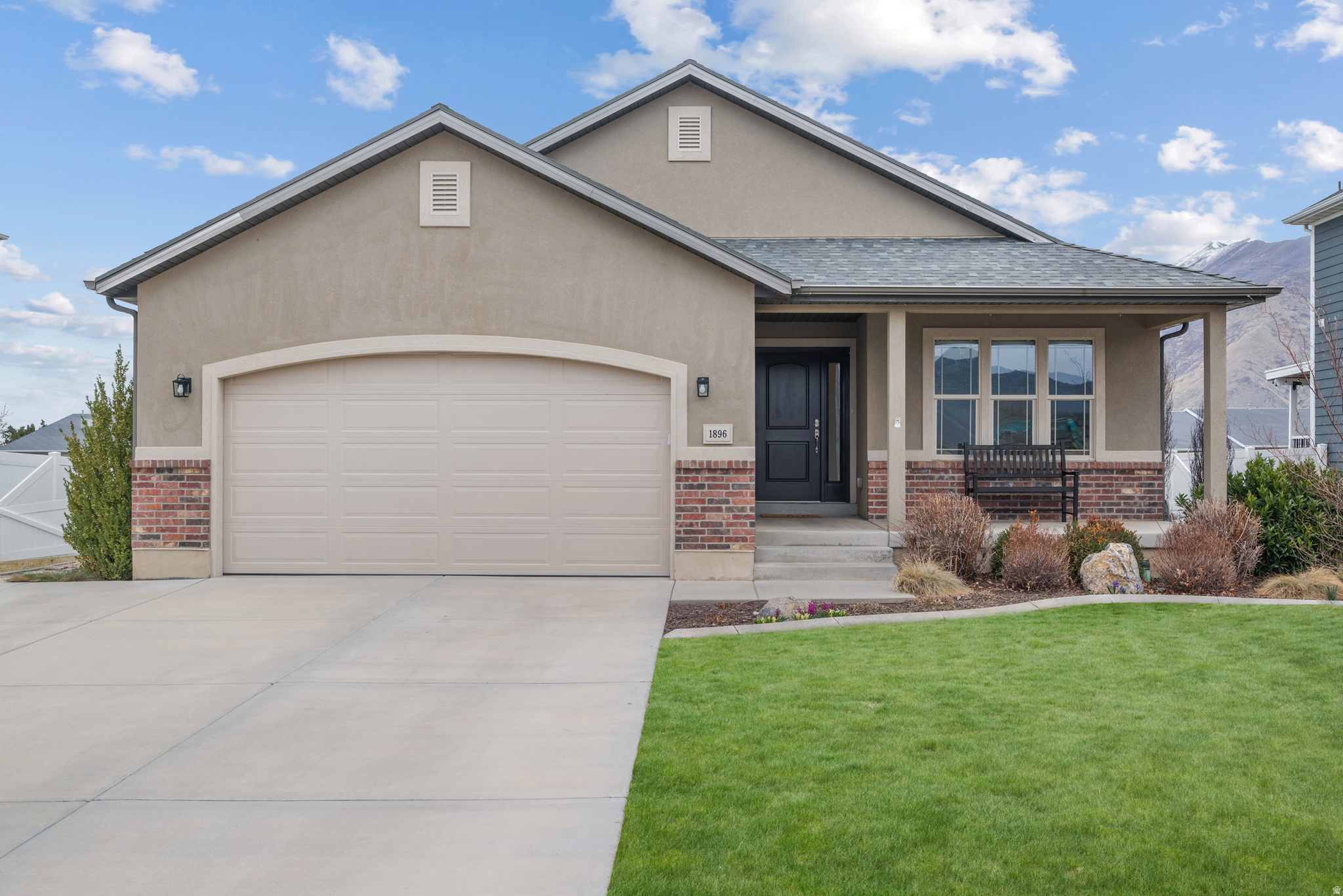 A stunning, meticulously remodeled 5-bedroom rambler that perfectly blends modern luxury with the charming, family-friendly vibe of Mapleton. Nestled in this peaceful, growing community at the base of the stunning Maple Mountains, this single-level beauty has been thoughtfully updated inside and out, offering turnkey living with no detail overlooked. Step inside to discover a bright, open layout featuring fresh paint throughout, brand-new flooring, and elegant new cabinets that elevate every space.  Modern finishes highlight the remodeled kitchen and Master Suite. Upstairs, you'll love the expansive laundry/craft room-a rare and practical bonus that provides plenty of space for hobbies, organization, or even a home office setup.  The fully finished basement expands your living options with a large, inviting entertaining area ideal for movie nights, game days, holiday gatherings, or hosting friends and family. Additional updates include a newer AC unit, furnace, and hot water heater for year-round comfort and peace of mind.  The freshly landscaped yard offers multiple planter and gardening boxes.  Mapleton offers the best of small-town Utah living-friendly neighbors, excellent schools in the Nebo District, abundant parks, scenic trails, and easy access to outdoor adventures in Maple Canyon, while being just a short drive from Provo, BYU, and the vibrant Utah County amenities.
