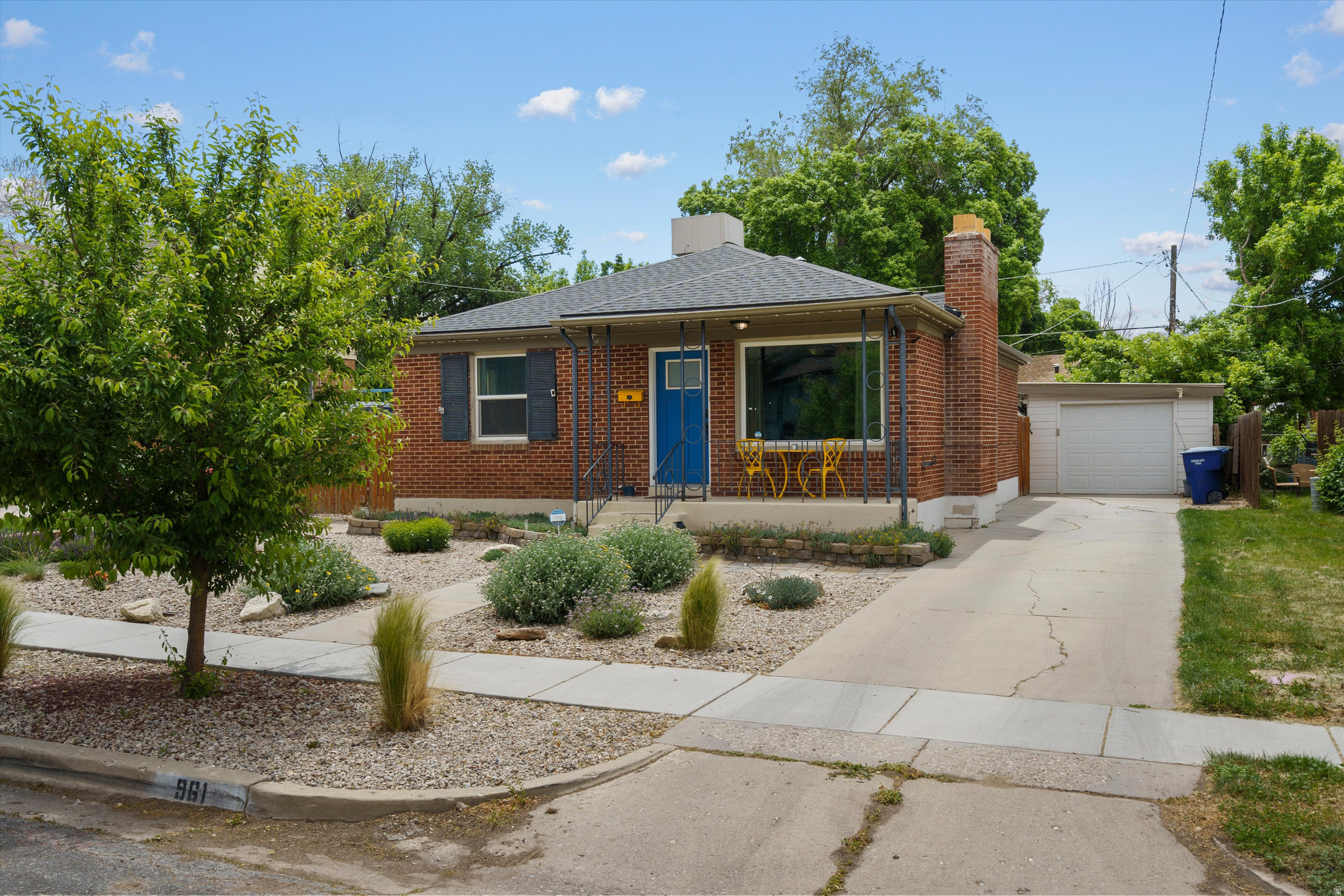 Move-in ready brick rambler in a highly desirable, tree-lined Southeast Ogden neighborhood. The heavy lifting is done with a 5-year-old roof, new windows, LED lighting, and a sustainable, low-maintenance xeriscaped front yard. The interior features open living spaces across both levels, real hardwood floors, and a charming kitchen beautifully upgraded with quartz countertops. Three bedrooms rest comfortably on the main level.  Step into your private backyard oasis, complete with a low-maintenance Trex deck, covered patio, hot tub, and a 15ft pool on a dedicated concrete pad. The detached garage comes fully equipped with an installed EV charger. Located just minutes from Weber State University and within walking distance to the newly remodeled Liberty Elementary. This is the perfect blend of modern convenience and outdoor lifestyle!