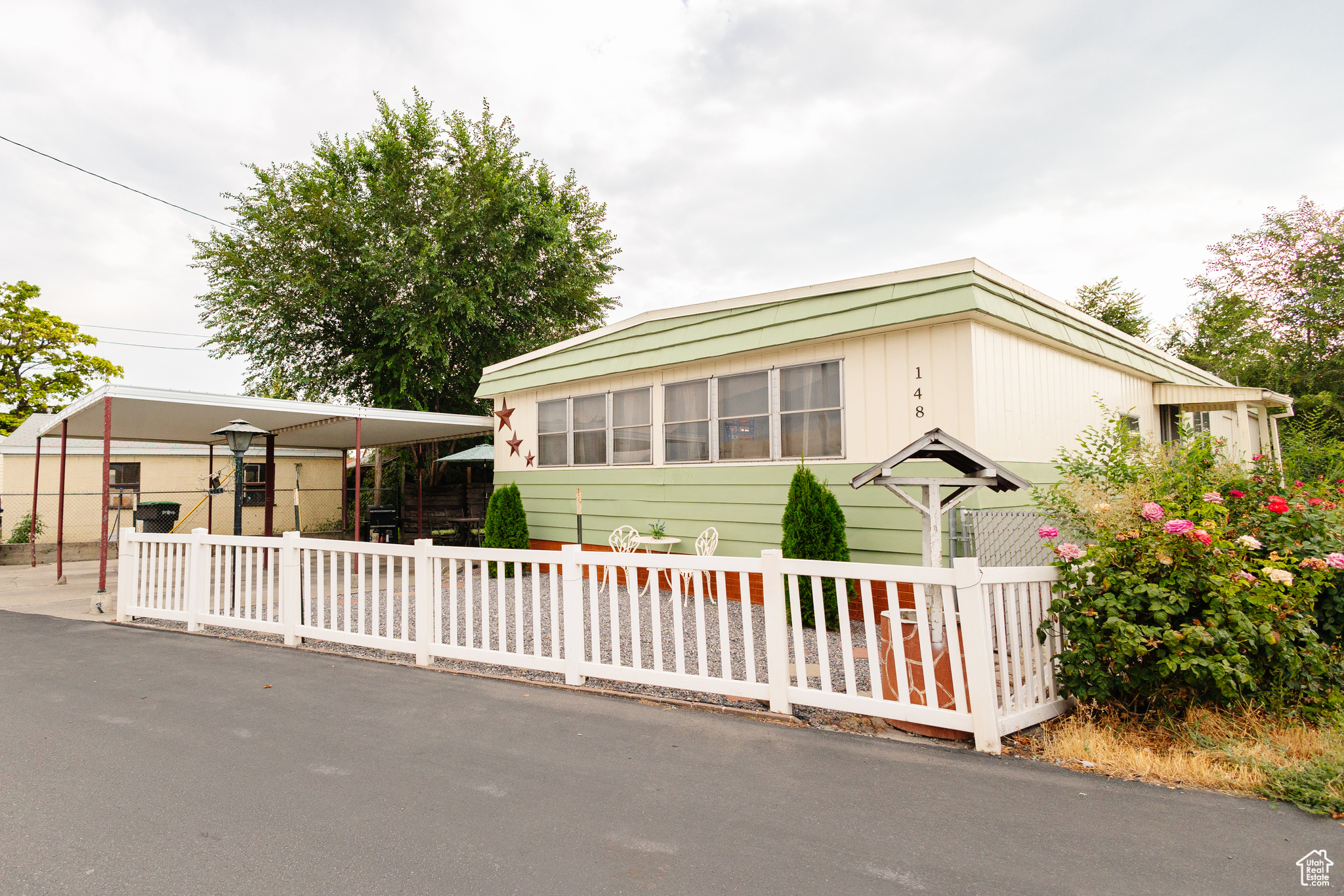 Looking for a property that offers both comfort and unbeatable convenience? This well-maintained manufactured home is located just steps from I-15, making your daily commute, errands, and access to nearby towns, cities, Universities, incredibly easy. Whether you're a first-time buyer, downsizing, or looking for an investment property with high rental potential, this location is hard to beat! Set on a spacious lot with plenty of parking, this home offers privacy and easy access to major services and transportation routes. The surrounding area is peaceful, yet close to shopping, dining, schools, parks, and more. With easy highway access, you'll save time every day while enjoying the benefits of a tranquil residential setting. The home itself features a functional layout, generous square footage, and an inviting living space. Depending on the setup, you could enjoy multiple bedrooms, a full kitchen, laundry space, and even a small yard or deck for outdoor enjoyment. Don't miss this rare chance to own a manufactured home with direct highway access, ideal for truckers, commuters, or anyone needing fast mobility. Contact us today to schedule your private tour!