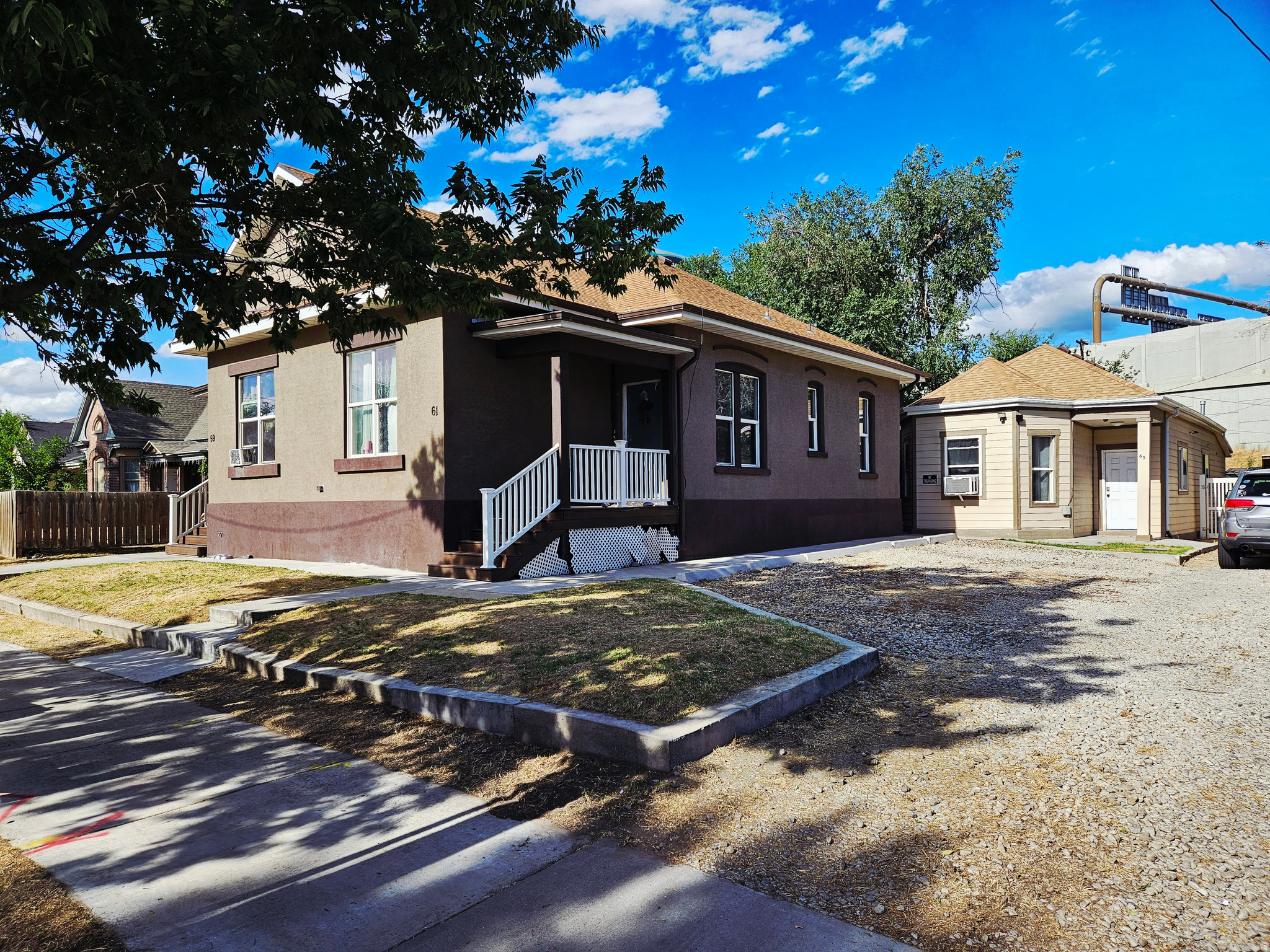 Great Investment property.  Side by side duplex w/ Cottage in rear property.  Rents easily, close to Downtown and freeway access.  Significant Development opportunity aplenty.