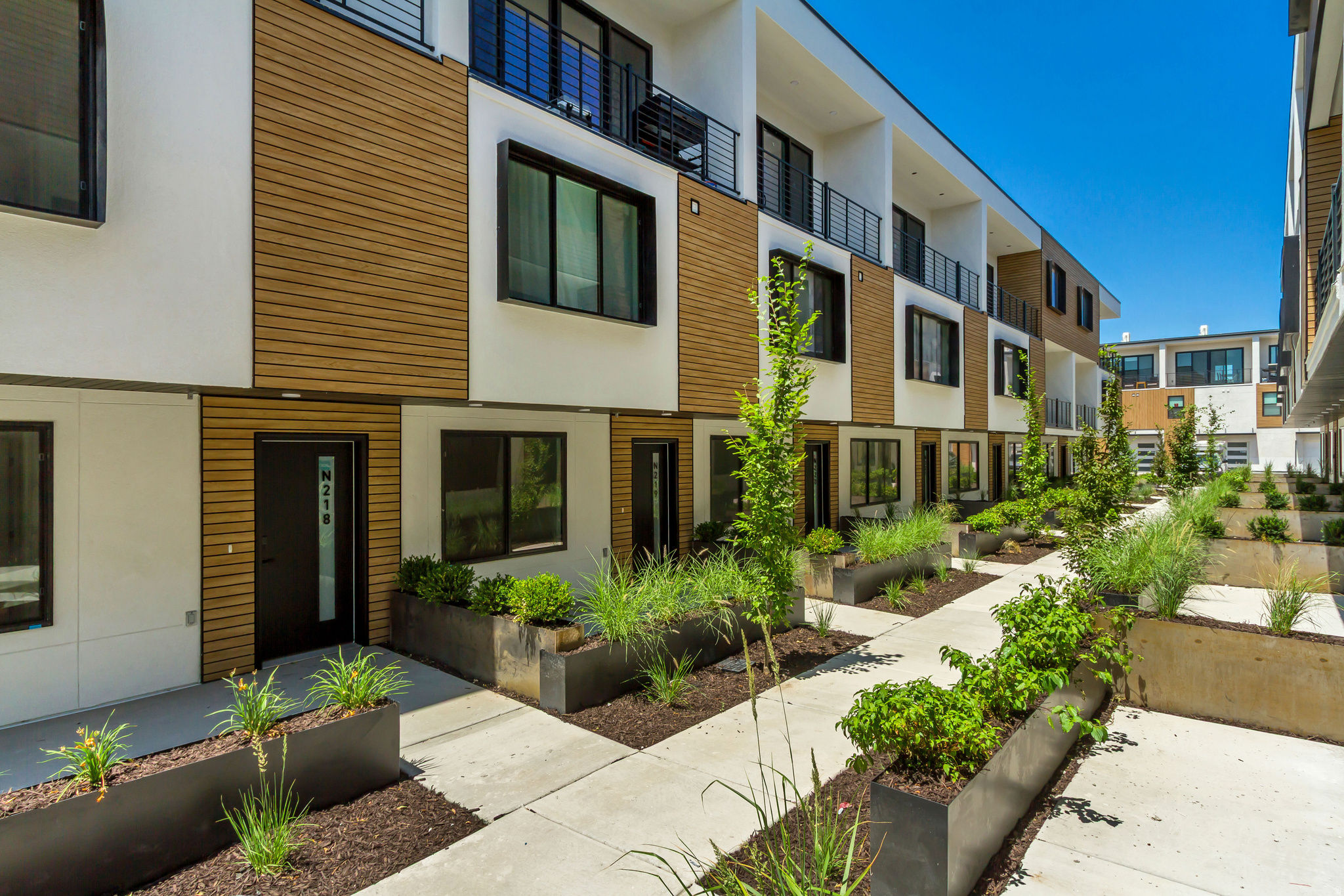 GREAT INVESTMENT OPPORTUNITY! NEW CONSTRUCTION... INVESTOR SPECIAL, TWO, 3 BEDROOM, 3.5 BATH UNITS... EASY TO RENT! Welcome to Opus Green. Experience the perfect harmony of modern comfort and environmental stewardship. Opus Green Townhomes offer a range of floor plans, including 2 and 3-bedroom townhomes, designed with meticulous attention to detail. From the spacious great rooms and gourmet kitchens to the tiled showers and open stair railings, every aspect of Opus Green exudes sophistication and elegance for your comfort. This modern townhome community is all-electric with 9'7" cathedral ceilings, tiled showers and tubs with glass doors. Best in class, ductless, wall-mounted mini split air conditioners. Quartz countertops and a one of a kind floorplan not seen before. This 3 bed 3.5 bathroom oasis will leave you green with envy. The 2 car garage with EV charging station, 1 touch smart home temperature control app and package storage/delivery service "Fetch Package", are just a few more added benefits to this zero emission environmental living townhome. Embrace a life of unparalleled comfort, elegance and fulfillment in the dwelling you've been longing for.
