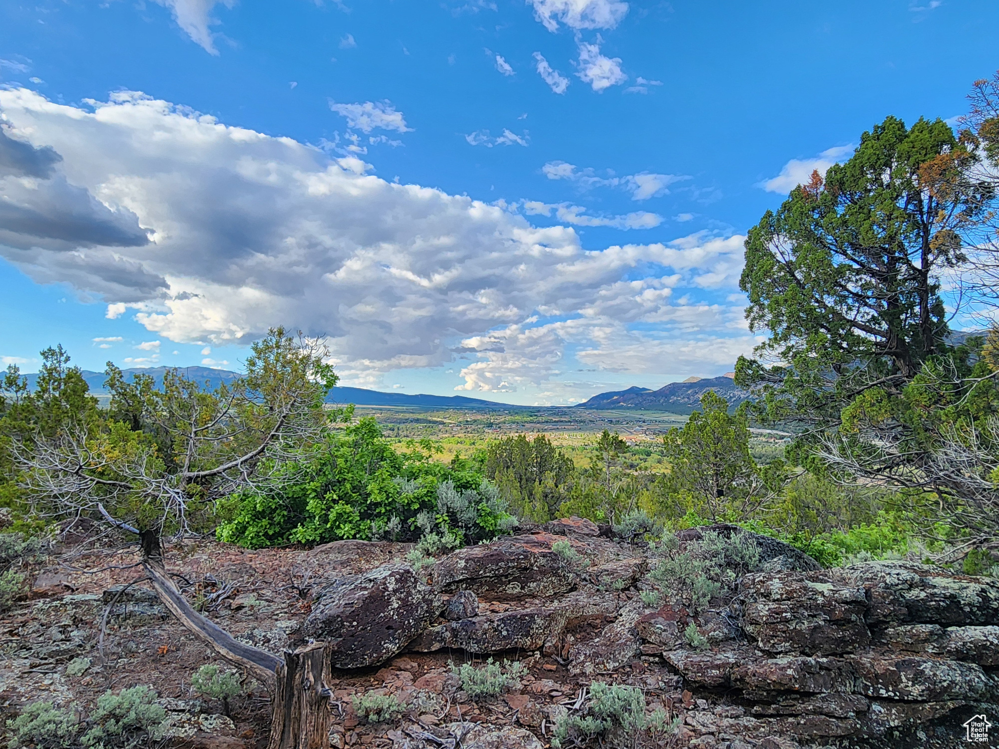Imagine a sprawling 5-acre lot in New Harmony, boasting a panoramic view of the surrounding landscape; Zion National Park to the east, Pine Valley Mountains to the west, 360-degree views. This property is conveniently located just minutes to St. George or Cedar City. All utilities stubbed to lot and property has 1 acre share of water in the Mountain Springs water company. Ride from your home onto miles of trails ATV, hike or ride horses. This is an incredible community.