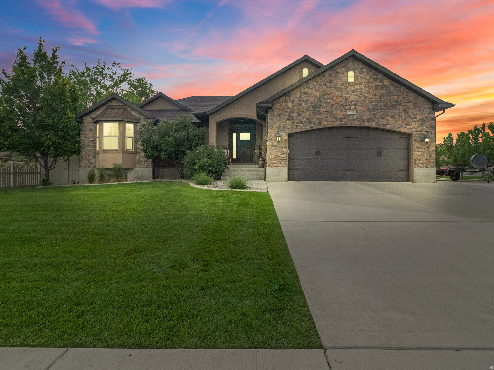 Wide open skies, room to breathe, and a home that has everything. With 5 bedrooms, 4 bathrooms, and a finished basement, there's space for the whole family. The kitchen features granite countertops, a walk-in pantry, a Bosch dishwasher, and a versatile induction stove plumbed for both gas and electric. Featuring plantation shutters and hand hewn wood floors.  When it's time to unwind, the spacious basement family room is ready for movie nights and weekend get-togethers. Step outside to a beautifully maintained, fully fenced yard with a shed and RV parking secured behind the gate. Epoxy garage floors add that finishing touch. Square footage figures are provided as a courtesy estimate only and were obtained from county records.  Buyer is advised to obtain an independent measurement.