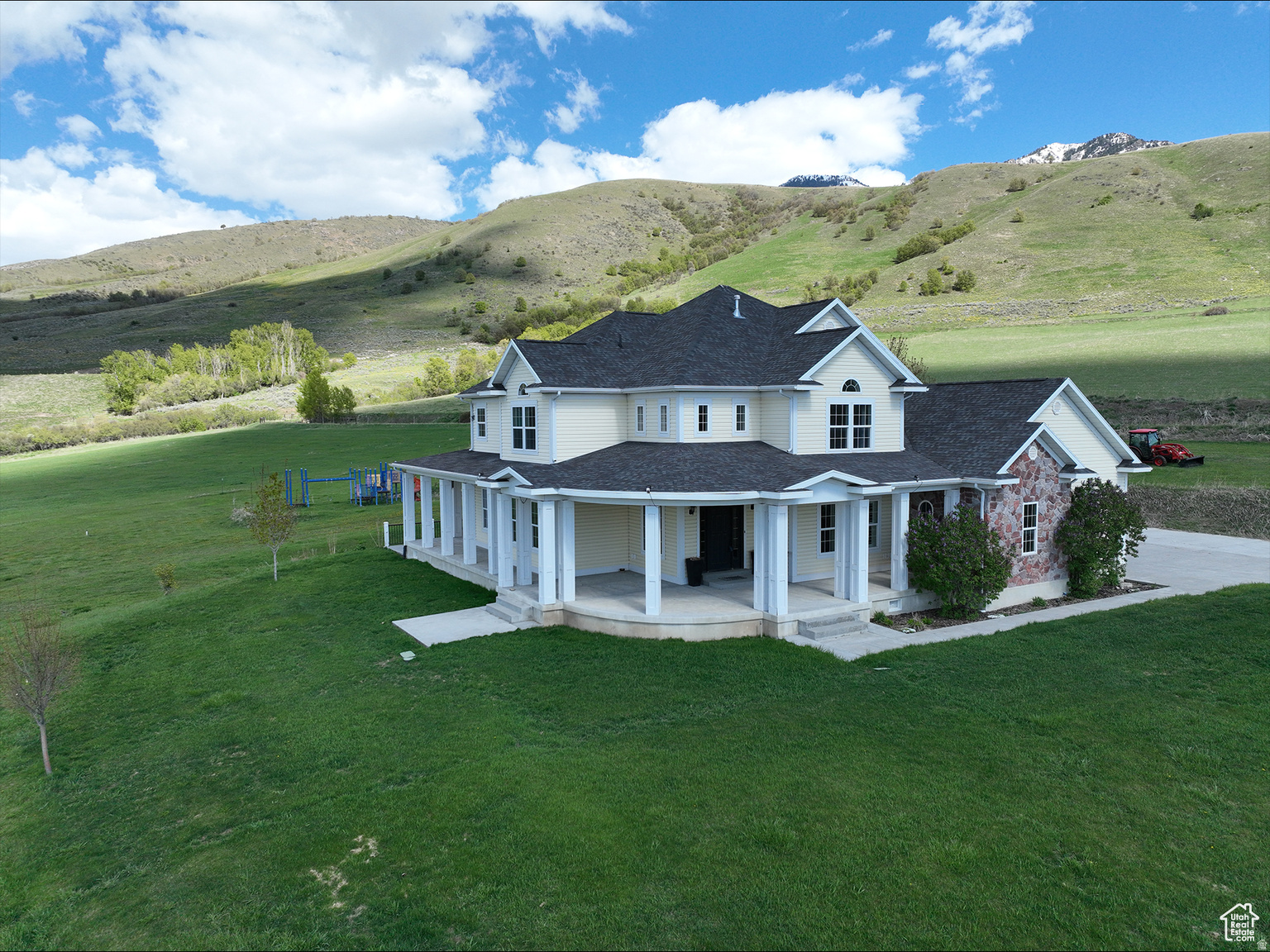 A Private Lane nestled in the foothills of the Bear River Mountains leads to this secluded estate on the Cove bench! This custom estate overlooking northern Cache Valley includes a two-story home with large rotunda, wrap-around porch, gourmet kitchen, executive suite, theater room, gym, and vault room. You'll love the open-concept layout featuring an elegant staircase and panoramic views from every angle as well as the oversized deck, walk-out basement with a massive storage area and 9' ceilings. Call today for a private showing.