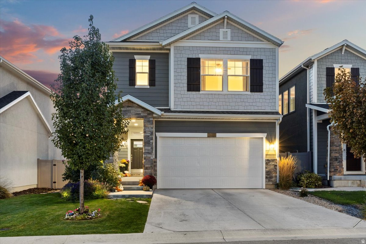 Less than a block from the 64-acre Wheadon Farm Park. Nestled in a prime Draper location, within ten minutes of three dual-immersion schools offering French, Spanish, and Chinese, with quick access to I-15. This lovely recently-built home boasts mountain views from the primary bedroom and bathroom, nine-foot ceilings and large windows that provide natural light throughout all three levels. A freshly finished basement includes a wet bar and thoughtful use of every space. The private backyard comes with custom raised garden boxes, berry bushes, and a patio with string lights, perfect for entertaining.