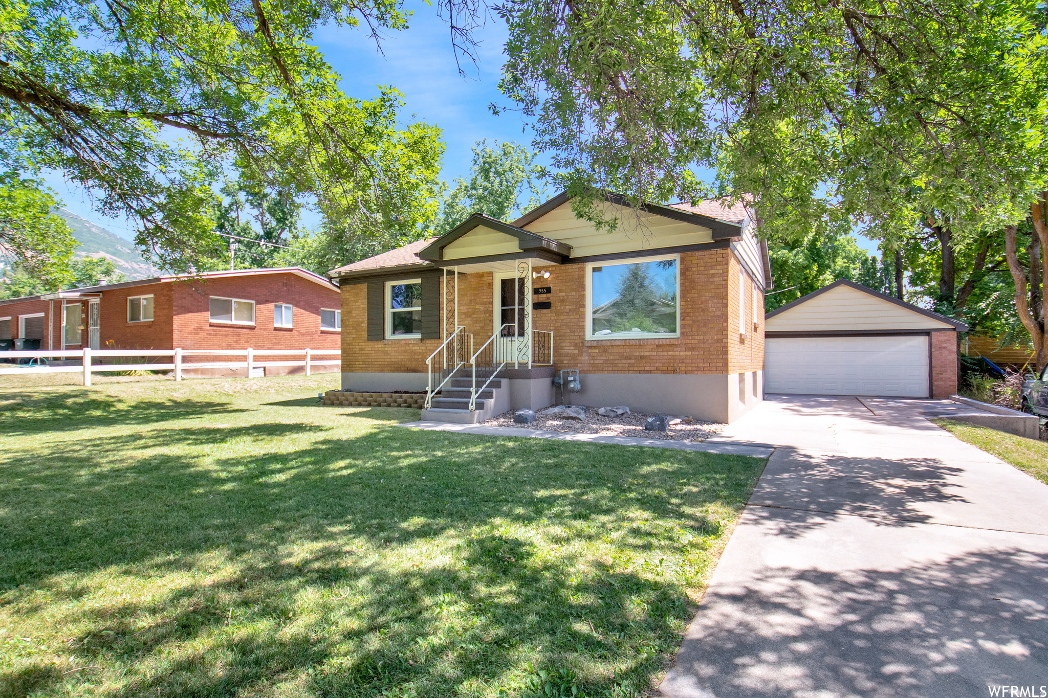 This location is hard to beat! Solid Brick Rambler with Oak Hardwood floors, vinyl thermal windows, updated kitchen and laundry hookups on the main. Plus, newer furnace, and A/C water heater, Knotty Pine family room, 2nd kitchen and laundry hookups down! Perfect for multi-generational families or rental income to help with the house payment! Easy access to Weber State, McKay Dee Hospital, OGX bus route, HAFB, hiking trails and skiing!