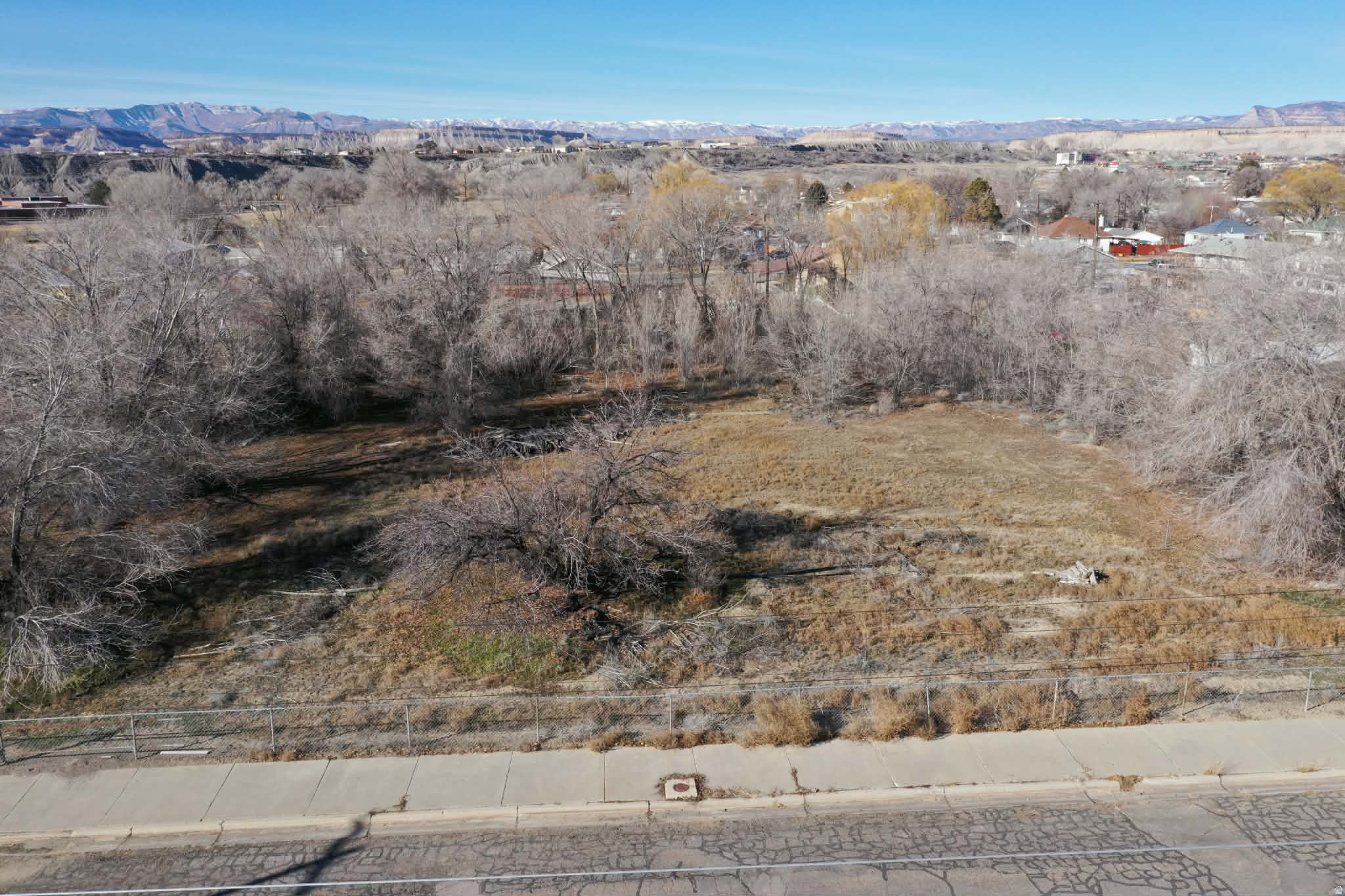 Rare .96-acre building lot in the heart of town! This nearly one-acre parcel offers a unique opportunity to build while enjoying the convenience of in-town living. Located close to schools, shopping, dining, and everyday amenities, this lot provides both space and accessibility. A hard-to-find combination of size and location, perfect for a custom home or future investment. Bring your plans and take advantage of this prime building opportunity.  Lot size figures are provided as a courtesy estimate only and were obtained from Carbon/Emery .  Buyer is advised to obtain an independent measurement.