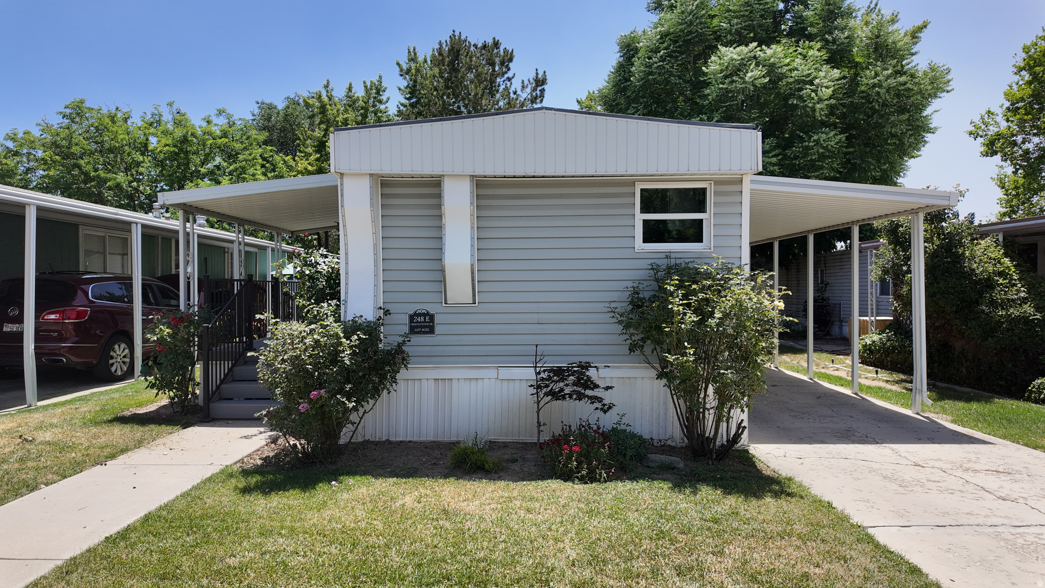 Updated throughout and move-in ready, this 1 bed, 1 bath home is located in Crescentwood, one of Sandy's most desirable manufactured home communities. Updates include the kitchen, bathroom, bedroom, flooring, insulation, subfloor, tankless water heater, two mini split systems, and new east and west-facing decks. Enjoy covered parking and access to community amenities including a pool, playground, picnic area, snow removal, trash, sewer, and on-site management. There are good lending options for this type of home, so please reach out if you need lender recommendations. Square footage provided as a courtesy. Buyer to verify all information. Tax Parcel # for the mobile home is pending.