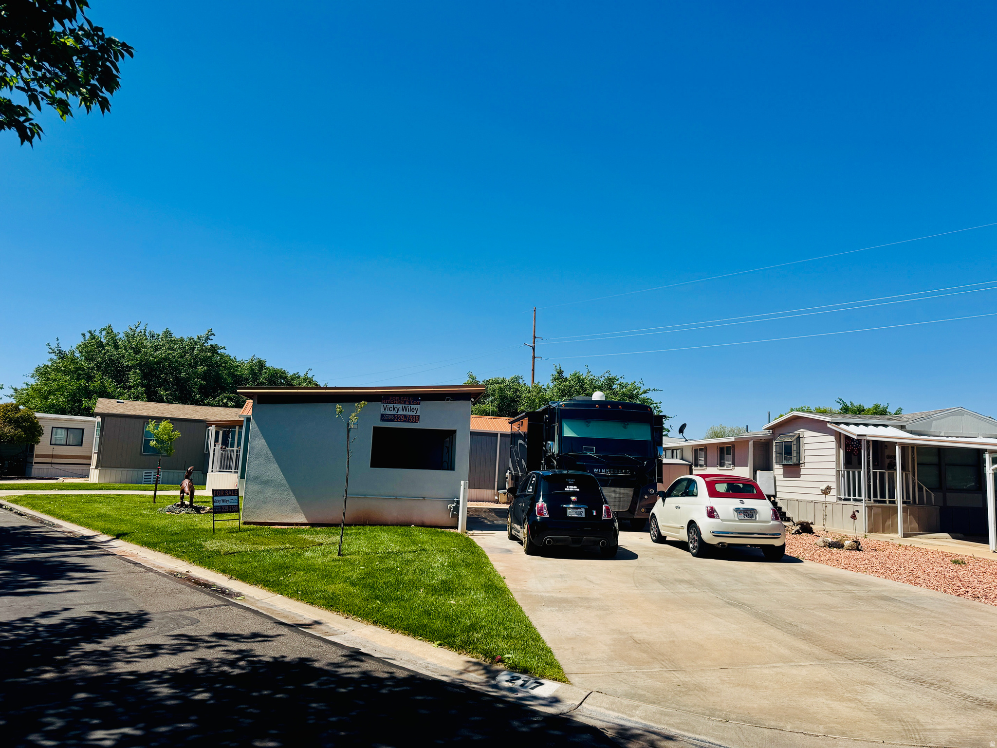 Take a look at this property. It is a one of a kind. The lot is extremely large to accommodate your big RV. Behold the OUTDOOR KITCHEN. Enjoy the Comfy Furniture, watch football, and feast on your delicious food that you have prepared. There is a 5 Burner Barbecue, 2 Burner Broiler, and a large Grill. You can accommodate a lot of guest/family easily. Don't miss out. 55+ Community.  Buyer to verify all information