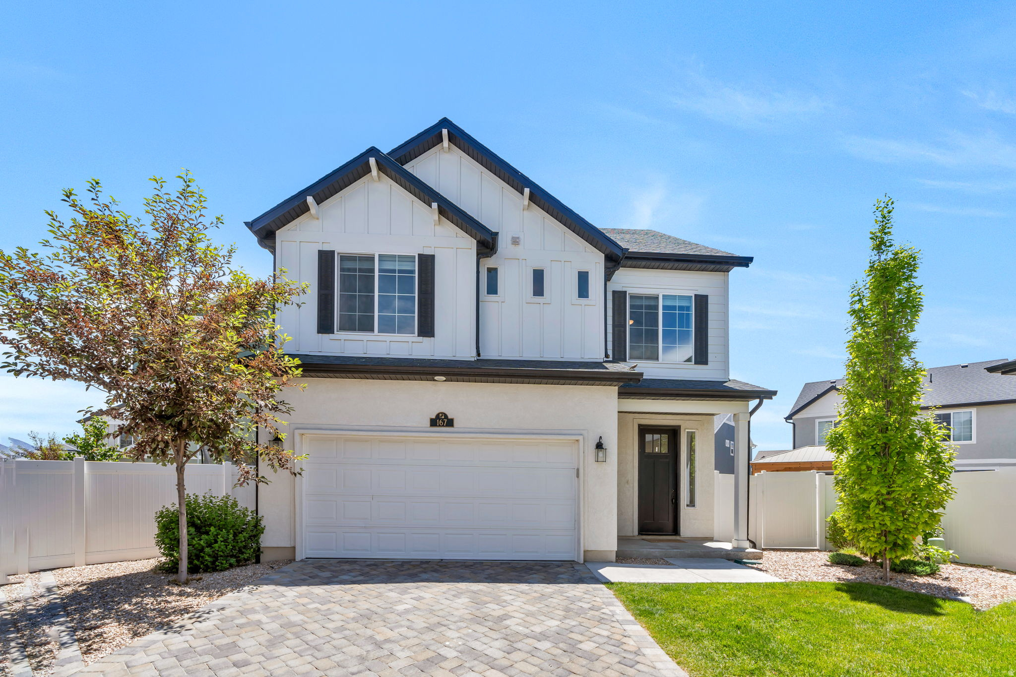 This bright and well-maintained home offers modern finishes, functional living spaces, and access to fantastic neighborhood amenities. The main level features are inviting and warm. The kitchen includes glacier grey cabinetry, sleek countertops, a large island with seating, pantry storage, and easy access to the fully fenced backyard. The primary suite offers great natural light, a walk-in closet, and an ensuite bathroom with a dual-sink vanity and walk-in shower. Additional bedrooms provide flexibility for guests, a nursery, home office, or playroom. The Wander community offers an incredible lifestyle with parks, walking trails, playgrounds, open green space, a community pool, nearby sports fields, pickleball courts, and beautiful views of Utah Lake and the surrounding mountains. Conveniently located near schools, shopping, dining, recreation, and major commuter routes. All information, figures, and documentation provided as a courtesy, buyer to verify all information.