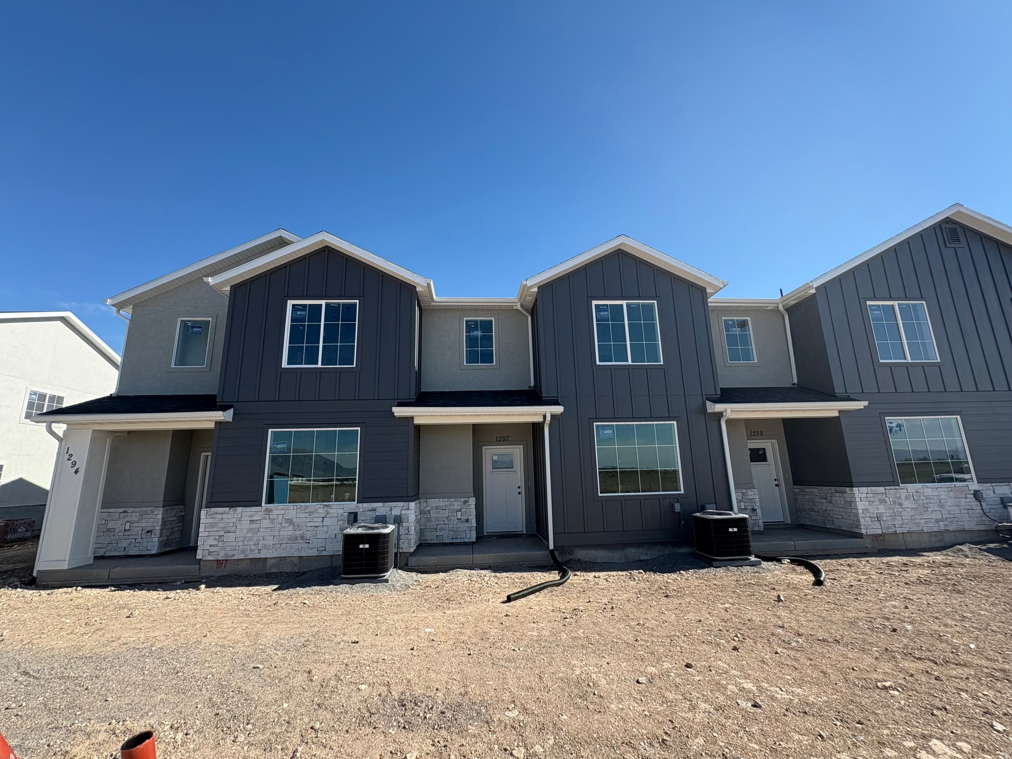 INTEREST RATES STARTING AS LOW AS 4.99% with our preferred lender or $15,000 INCENTIVE towards closing costs, rate buydown, or price reduction regardless of lender! (Talk to agent for conditions.) This is our Must-See New Arrowhead Springs Community in Salem!  This beautiful townhome is being built by Flagship Homes and will be completed at the end of June! This townhome features 4 bedrooms, 2.5 bathrooms, quartz slab countertops, painted cabinets, laminate flooring on the main level, and a 2 car garage. The primary bedroom has a vaulted ceiling, walk-in closet, dual sinks, and separate tub and shower! Our Arrowhead Springs community will have a  52-acre park, clubhouses, pools and everything you can think of when it comes to Amenities! This community is close to the Freeway (4 minutes) and is in a beautiful location! Call Seth for more information or stop by our model home at 1197 N 1020 W, Salem, Utah 84653 for a tour. Model home hours: Monday-Saturday 11 AM - 6 PM. Buyers to verify all information. Square footage is from house plans.