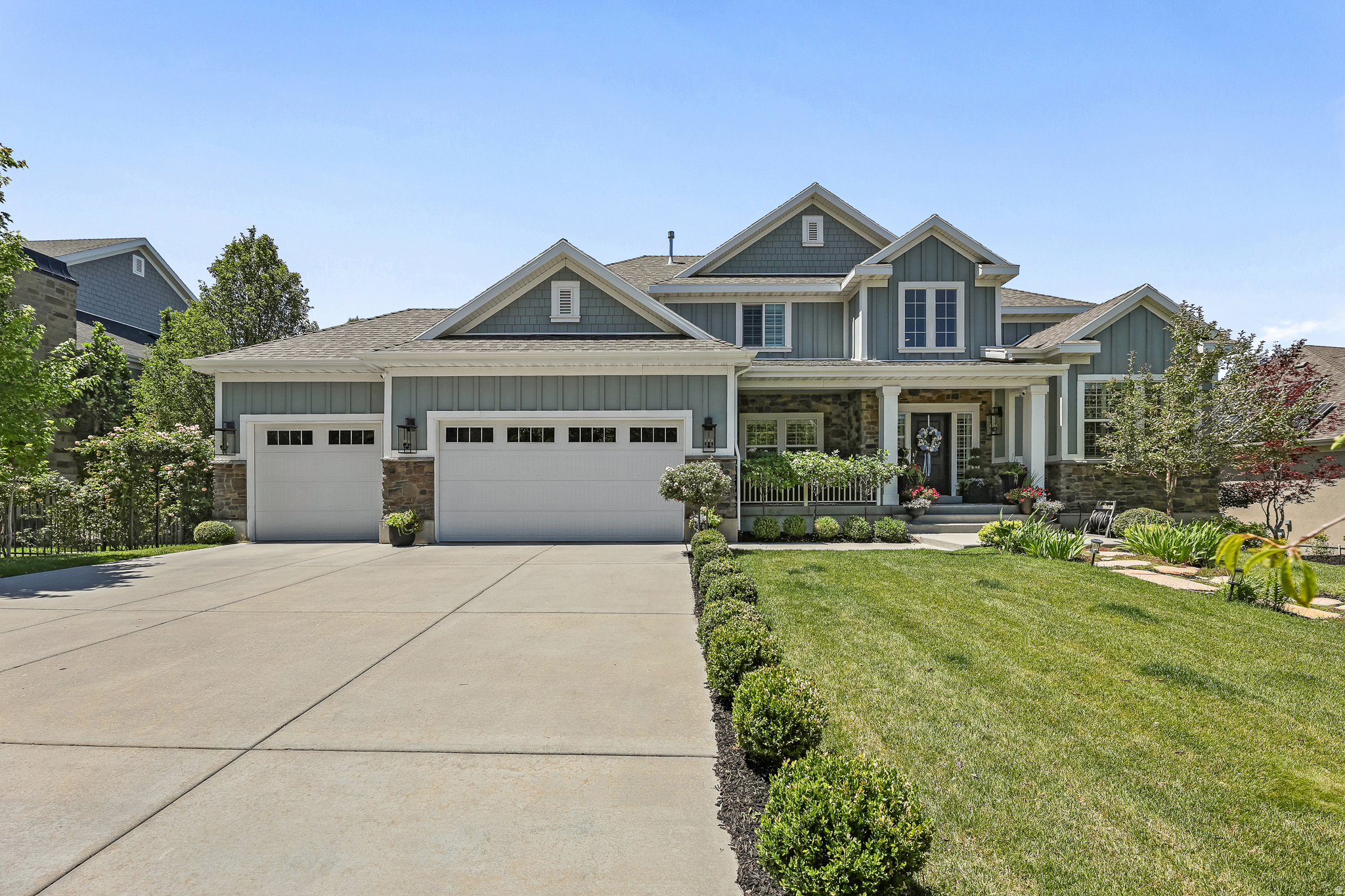 Gorgeous home with no backyard neighbors in a coveted neighborhood featuring a community pool! This meticulously cared for home offers 6 spacious bedrooms, including 3 with private en-suites - one on each floor - providing exceptional comfort and flexibility for family and guests. The luxurious primary suite is a true retreat, featuring a walk-in closet and a boutique-style custom wardrobe room with thoughtfully designed shelving, drawers, and hanging space. Beautiful custom cabinetry, brand-new carpet, and beautifully finished spaces create a warm, inviting atmosphere throughout. The basement includes a second kitchen, second entrance, washer and dryer hookups, and dedicated workout room, making it ideal for entertaining or multi-generational living. Step outside to a private backyard with a huge deck perfect for summer barbecues and gatherings, all with the privacy of having no backyard neighbors. Car enthusiasts will appreciate the immaculate garage with epoxy floors. Incredible location within minutes of world-class hiking, biking, skiing, and access to downtown and Silicon Slopes. Buyer to verify all.