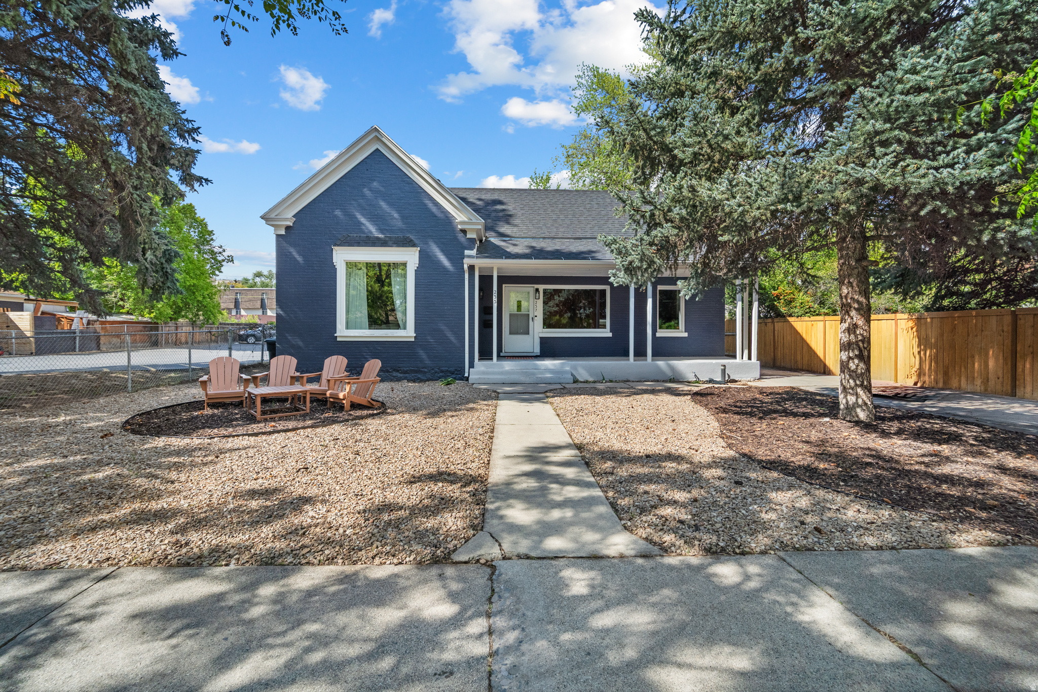 Turnkey duplex in the heart of Provo, on a huge .20 acre lot! This legal duplex at 255 & 257 E 200 S has separate addresses, meters, and fully independent units. The property includes a 1 bed/1 bath unit (900 sq ft) and a 2 bed/1 bath unit (1,116 sq ft), both with central heating and A/C. The property has seen a lot of solid updates over the past few years. In 2021, new windows, exterior paint, and front porch finishes were completed. The 2-bedroom unit was fully remodeled with new flooring, lighting, paint, and an opened-up kitchen/living area. The 1-bedroom unit has an updated bathroom and refreshed kitchen. Central A/C was added to both units, and the entire property was fully rewired in 2025 with upgraded panels and meters. All appliances are included and owned by the seller; fridges, ranges, washers, and dryers have all been replaced within the last 4 years. Tenants pay gas, electric, and internet, while the owner covers water/sewer. Both units are currently rented with leases through July 31st. Rents are $1,350 and $1,550/month, with the 2-bedroom unit currently below market due to a mid-lease adjustment, leaving room for upside. Easy to rent location close to downtown Provo, shopping, dining, and local universities. Turnkey property with strong rental potential.  Square footage figures are provided as a courtesy estimate only and were obtained from county record. Buyer is advised to obtain an independent measurement.