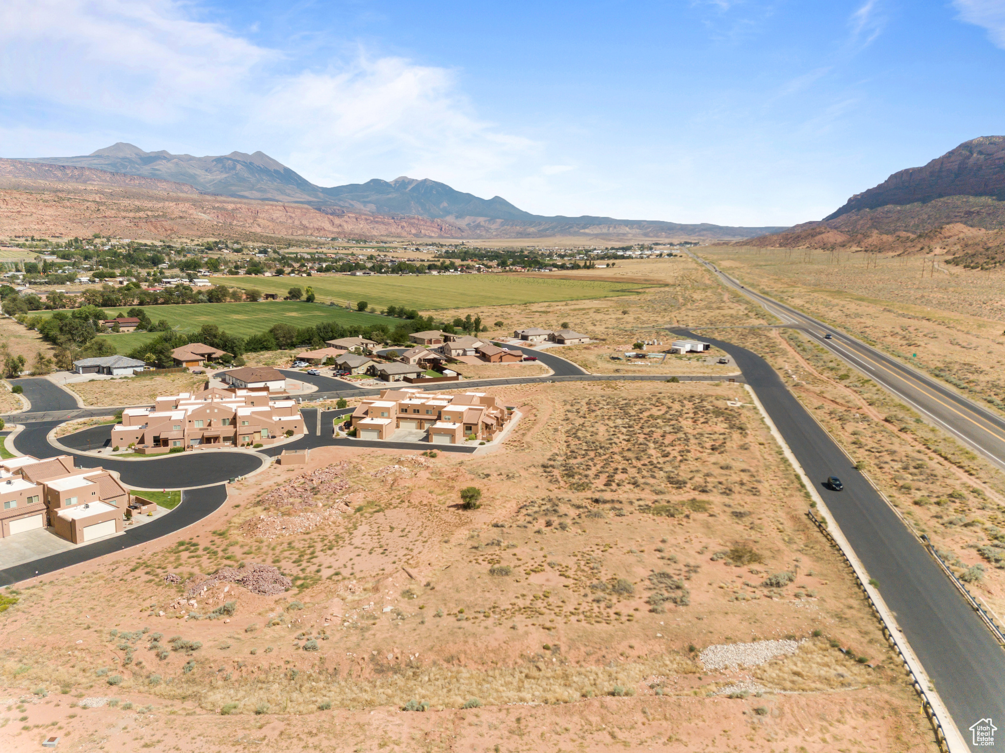 Exceptional Development Opportunity in Moab, Utah. The Current owner has retired and in the process of liquidating his real estate assets.  Presenting an approved 5.6 -acre development in the heart of Moab with the potential for up to 57 units. This prime property is fully entitled and ready to break ground, offering an incredible opportunity for builders and investors alike. Nestled amid Moab's stunning red rock scenery and world-class outdoor recreation, this location is ideal for a vibrant residential community.  With approvals in place, infrastructure-ready this is an already proven project with a 136 units already completed.  Don't miss your chance to be part of Moab's growth-construction can start immediately.