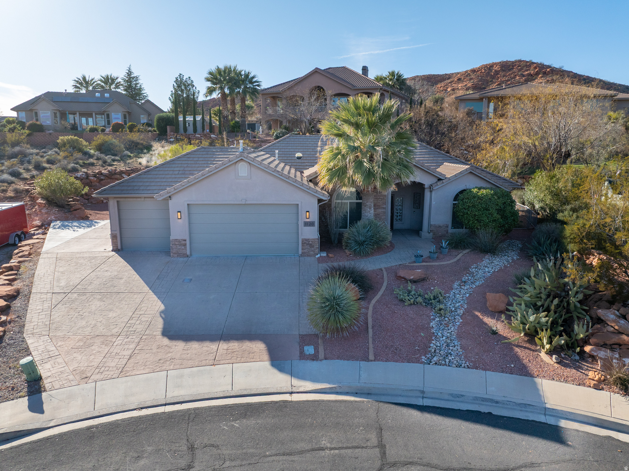 **Private Pool. Mountain Views. Cul-de-Sac Living** Tucked away at the end of a quiet cul-de-sac, 1120 W Broadstone Ct offers privacy, comfort, and room to breathe. With no rear neighbors, mountain views, and a private pool, the backyard feels like your own slice of Southern Utah-perfect for quiet mornings or hosting the crew. The oversized lot includes full RV hookups with dedicated space to park your RV, adding flexibility that's hard to find. Inside, the home is bright and well laid out, with generous living spaces, a cozy fireplace, and plenty of natural light. Set on a larger lot with low-maintenance landscaping and a low HOA, it's as practical as it is peaceful. Close to parks, trails, golf, and everyday essentials, this one makes it easy to settle in and enjoy.