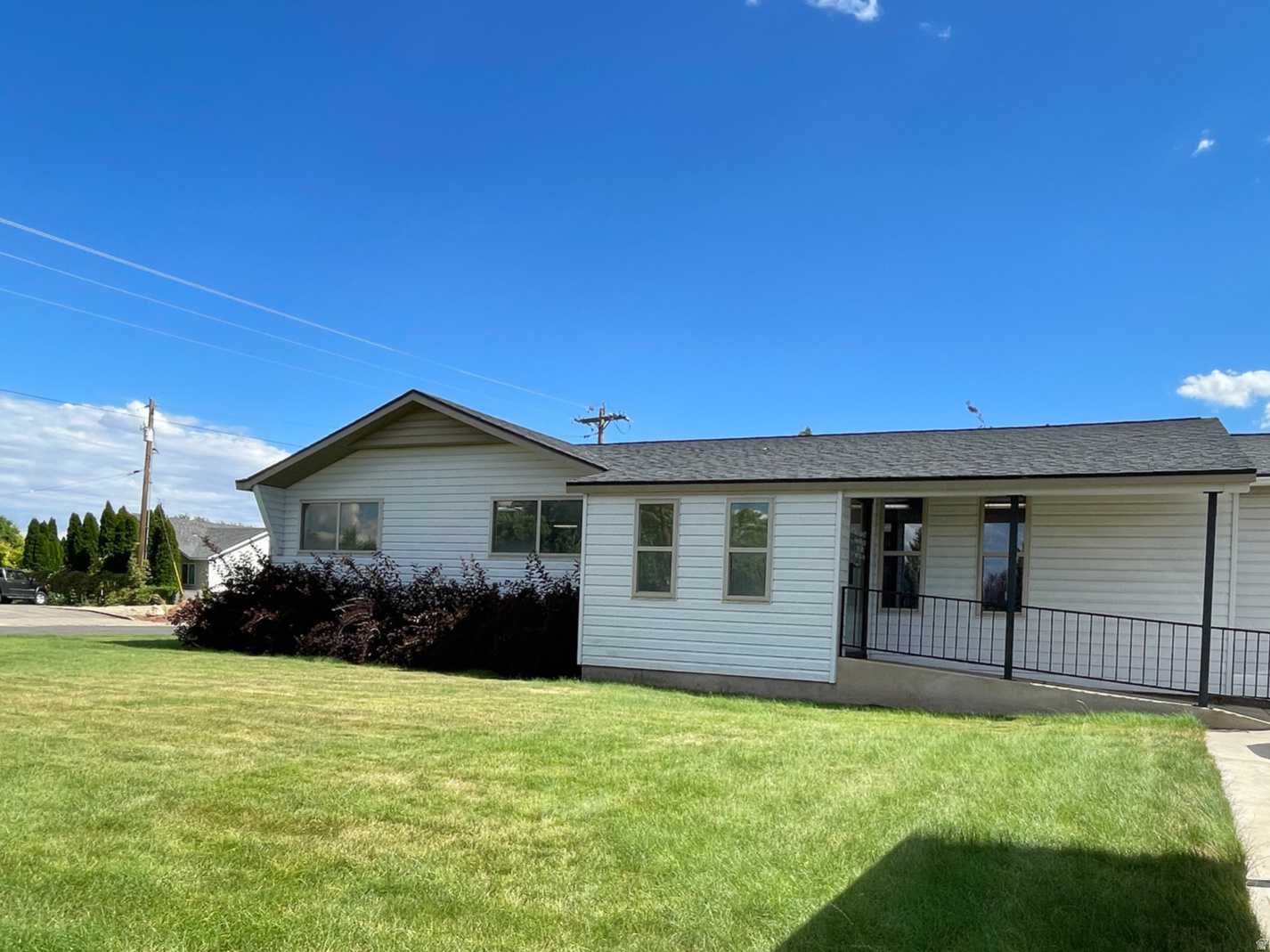 INCREDIBLE PRICE MEETS PERFECT LOCATION!! This 1700 Sq. Ft. building has a front reception counter and waiting room, 2 bathrooms, big open area where you can build your dream business!  Plumbing galore would make a great salon, daycare or office building, The options are endless! This space was built in 1973, but completely remodeled in 1994 with new wiring,plumbing, sheetrock and paint! Corner lot with asphalt and concrete driveway all the way around. Information based on county records, buyer to verify.