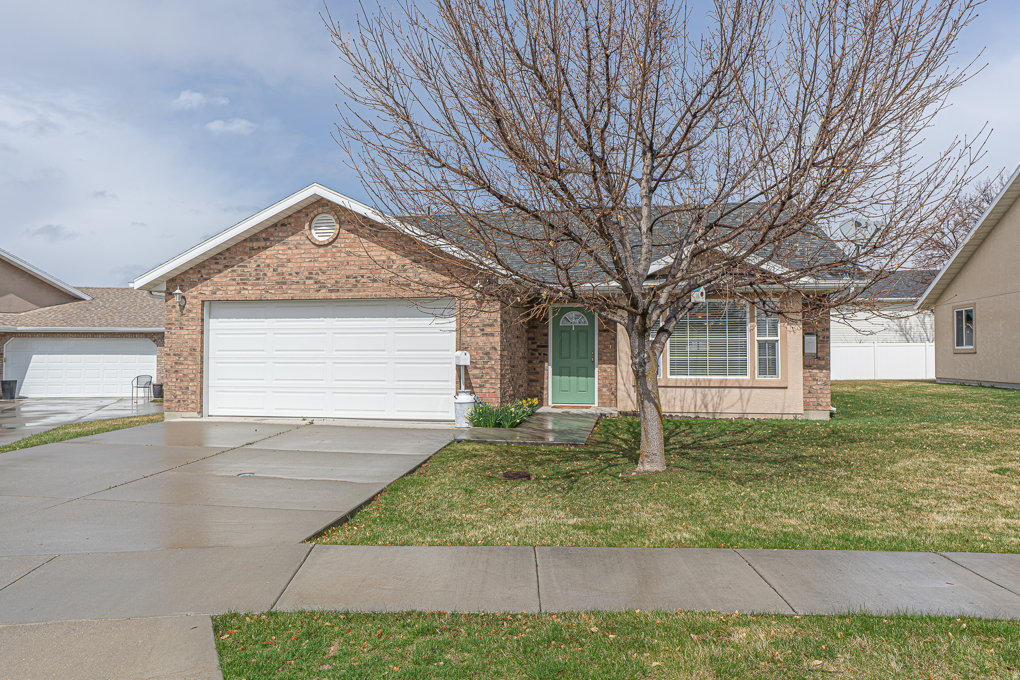 Charming 55+ Home in Hyde Park! Tucked in a quiet cul-de-sac, this clean and cozy 2-bed, 2-bath home offers easy one-level living. Enjoy a warm fireplace, spacious 2-car garage, and low-maintenance lifestyle in a welcoming community. Conveniently located near local amenities, this charming home is move-in ready!