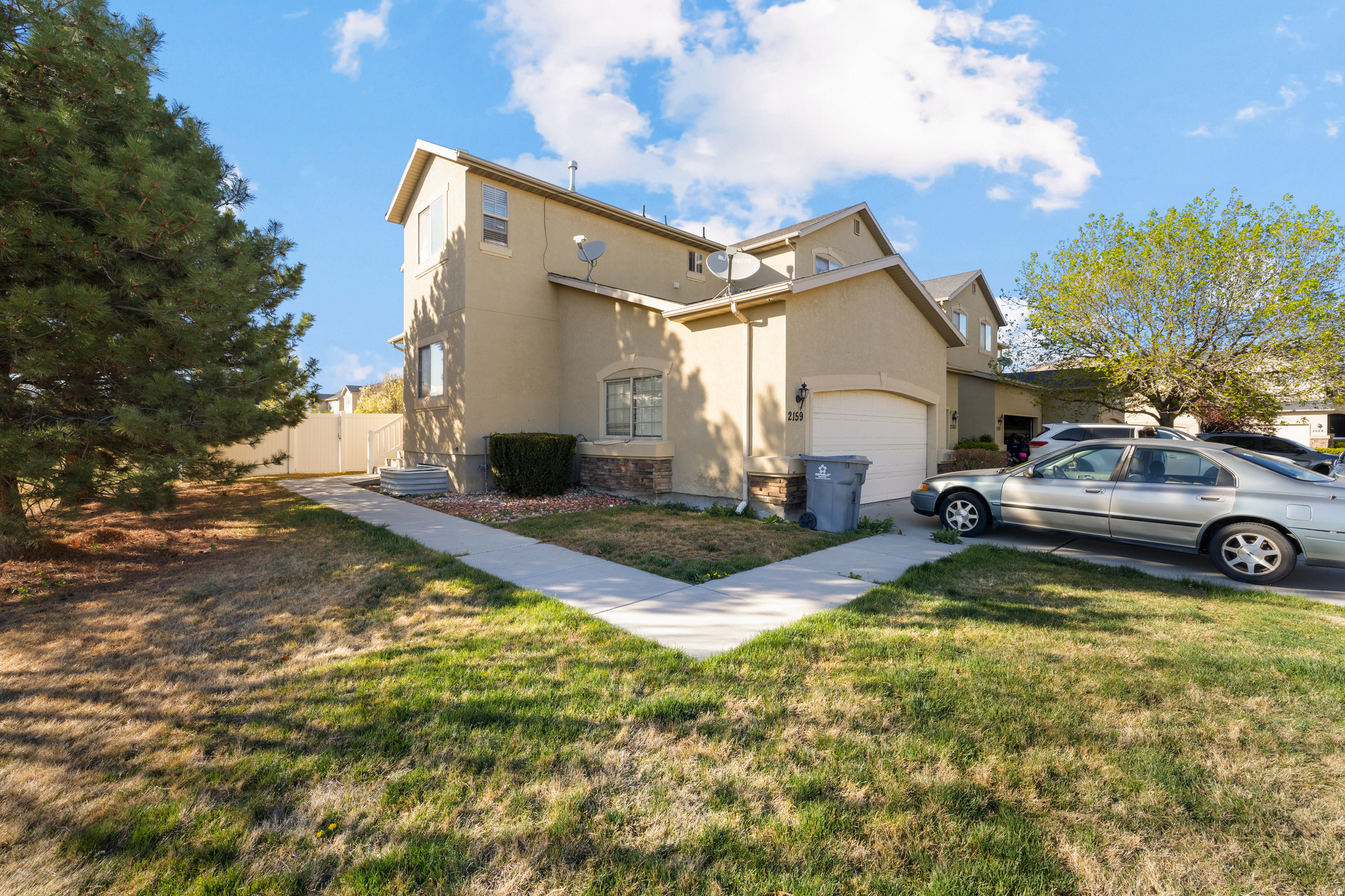 Rare 5-bedroom end-unit townhome nestled in the Pointe Meadows community of Lehi, one of Utah's fastest-growing cities!  With 2,004 square feet of fully finished living space spread across three levels, this home offers the space and flexibility of a single-family home at a townhome price. The main floor welcomes you with an open-concept kitchen and family room, perfect for entertaining. Upstairs you'll find spacious bedrooms and bathrooms, while the fully finished basement adds valuable bonus living space, ideal for a second family room, home office, gym, or guest suite.  As an end unit, you'll enjoy the luxury of extra windows, abundant natural light, and only one shared wall, giving you added privacy that interior units simply can't offer. Step outside and you're greeted by open green space right next door and stunning mountain views.   The attached garage keeps your vehicle protected year-round, and the low-maintenance HOA at just $180/month means your weekends are yours: no mowing, no exterior headaches. Located in the highly rated Alpine School District, with North Point Elementary just steps away, Willowcreek Middle School, and Skyridge High School all nearby.  Commuters will love the quick access to I-15 and the booming Silicon Slopes tech corridor, putting you minutes from major employers like Adobe, Ancestry, and IM Flash. Shopping, dining, and entertainment at Traverse Mountain Outlets are just around the corner.