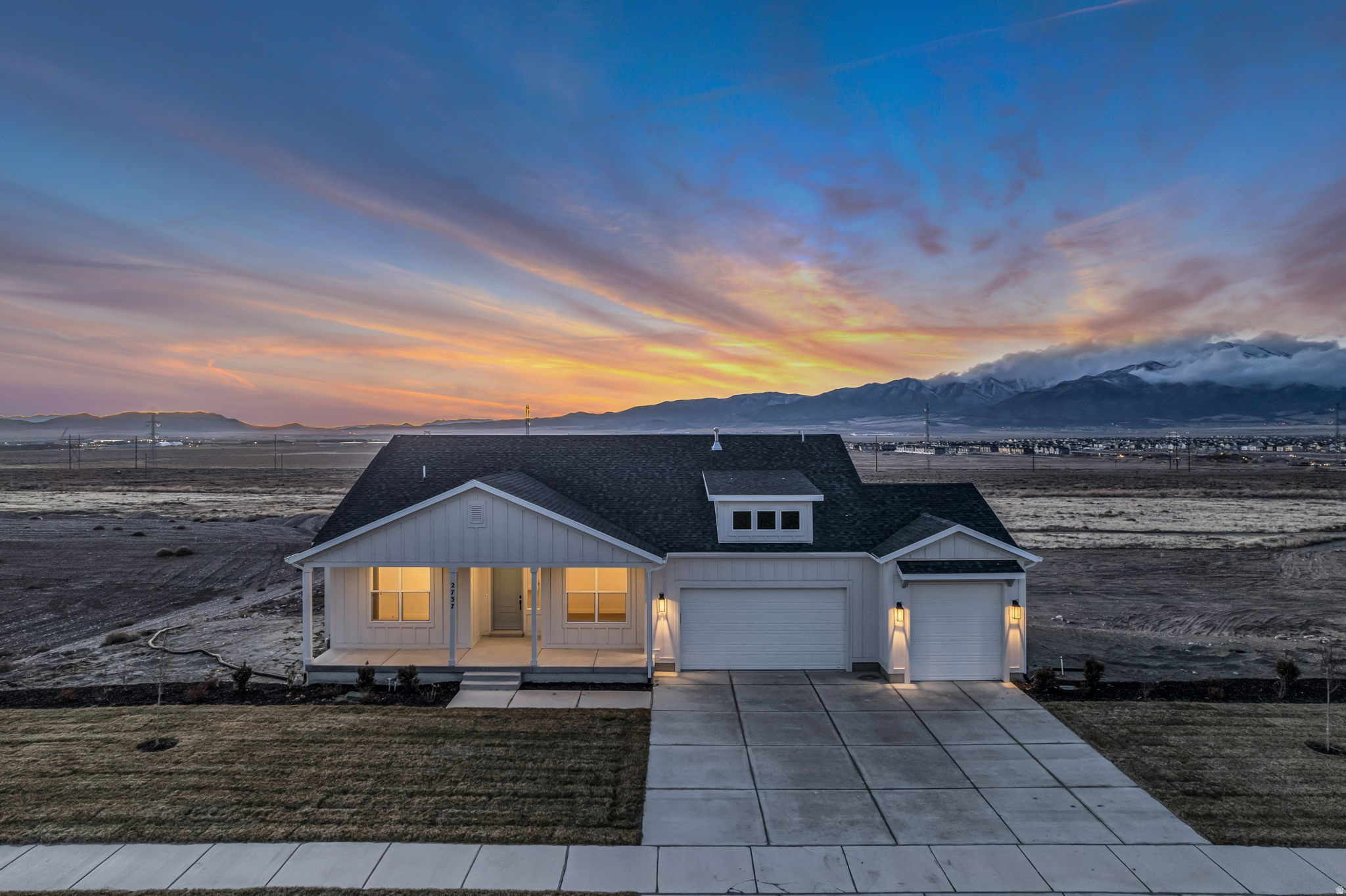AMAZING $30,000 INCENTIVE towards closing costs, rate buydown, or price reduction regardless of lender! (Talk to agent for conditions.) Must-see Scarlet Ridge Community in Eagle Mountain! Move-in ready! This beautiful home 4,400 sq. ft. home on a three-quarter acre view lot with a walk-out basement is built by Flagship Homes.  It features 3 bedrooms, 2.5 bathrooms, an office/living room, quartz slab countertops, painted cabinets, laminate flooring on the main level, vaulted ceilings throughout, landscaped front yard and 3 car garage. The backyard can be landscaped for an additional charge. The primary bedroom on the main floor has a vaulted ceiling, large walk-in closet and dual sinks with a separate tub/shower. With an unfinished, walk-out basement, this home provides space for storage and room to grow. (If preferred, basement can be finished for an additional charge.) 1GB fiber optic internet included in the HOA dues. Call for more information or stop by our model home at 1546 E. Starling Lane, Eagle Mountain for a tour. Model home hours: Monday-Saturday 11 AM - 6 PM. Buyers to verify all information. Square footage is from house plans.