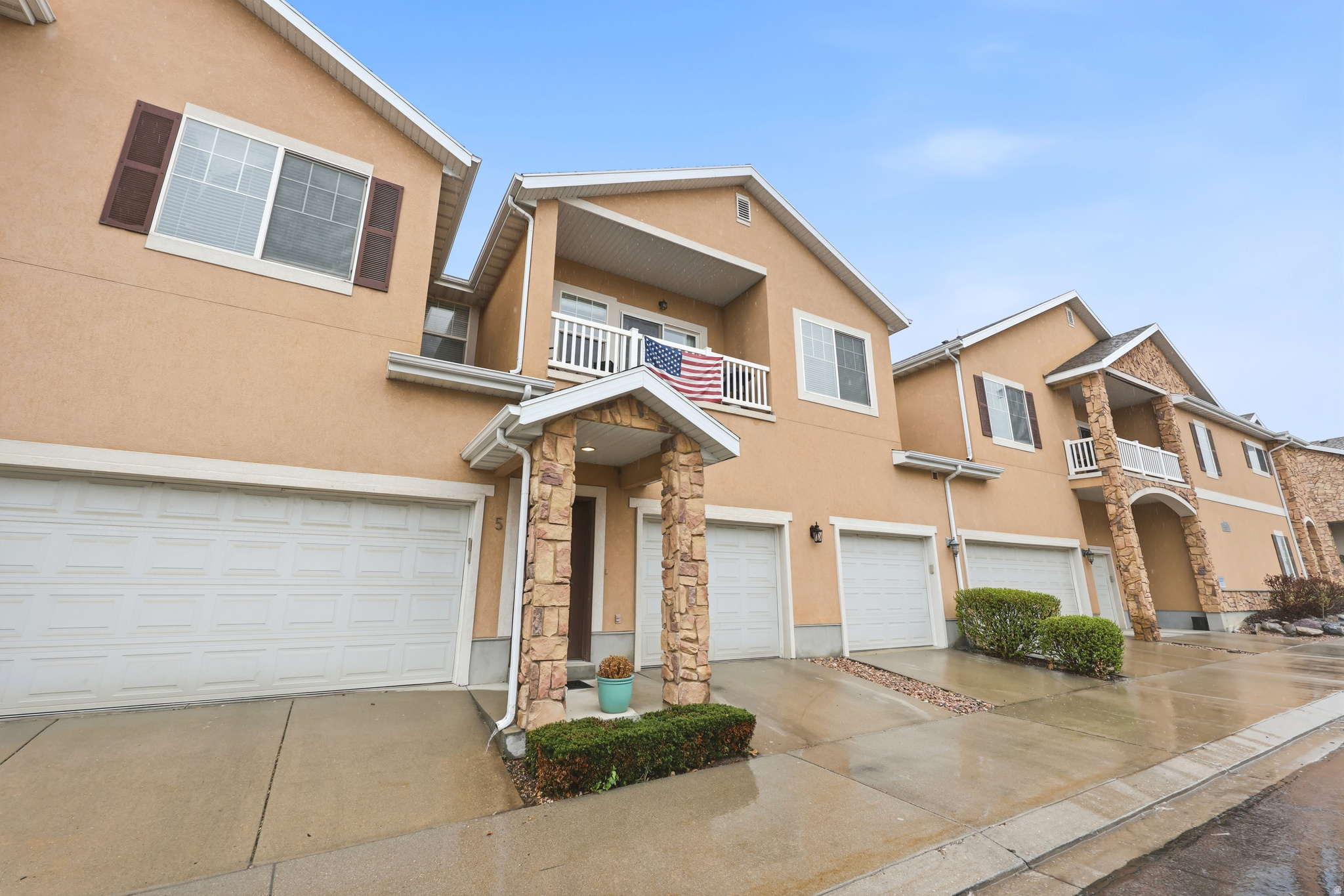 Charming 2-bedroom, 1-bath Canyon Meadow condo in the desirable Sunridge Hills community. This bright, open-concept home features large windows that flood the living spaces with natural light. The kitchen opens seamlessly to the living area and includes a refrigerator, range, dishwasher, and microwave, along with generous counter space, a bar area with room for barstools, and space for a dining table. The spacious primary bedroom offers a large walk-in closet, and the full bathroom provides ample counter space. Step outside to the private balcony-perfect for relaxing and taking in beautiful mountain and valley views. The extra-deep garage includes a large storage room in the back for added convenience. Located in the peaceful Ridge subdivision, this home backs to the mountains with quick access to the Bonneville Shoreline Trail. Just 1 mile from Provo City Center, you'll enjoy shopping, dining, art events, festivals, and a vibrant atmosphere. Conveniently close to I-15, BYU, and UVU. Year-round recreation surrounds the community, including winter sports, hiking, biking, and boating, along with neighborhood amenities such as playgrounds, a park, clubhouse, and pool.  Square footage figures are provided as a courtesy estimate only and were obtained from county records.  Buyer is advised to obtain an independent measurement.
