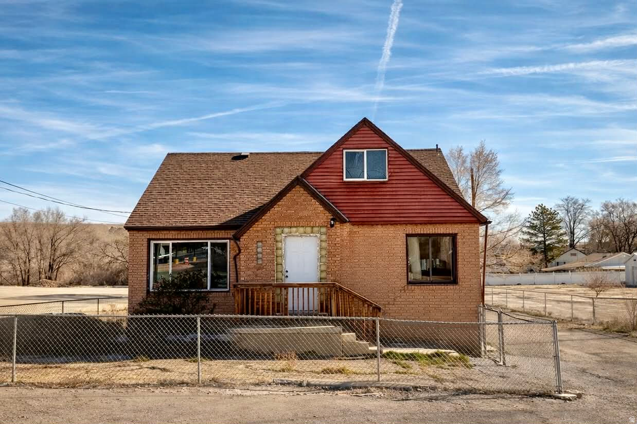 Unlock the potential at 489 S Highway 55-an affordable and uniquely laid-out home with space, character, and room to grow. This 3-bed, 3-bath property offers a practical floorplan with a spacious primary bedroom on the main level and two additional bedrooms tucked upstairs for added privacy. The main floor features a bright living room and a long galley-style kitchen with great cabinet storage and plenty of workspace. Downstairs, the wide-open basement provides a huge bonus area-perfect for storage, hobbies, a home gym, or future finishing if you want to add more living space or extra bedrooms. The partially fenced corner lot offers convenient access to town and gives you room for parking, pets, or outdoor projects. Whether you're looking for an affordable home with solid bones or a property you can personalize over time, this one delivers space, flexibility, and great value in the heart of Price. Square footage figures are provided as a courtesy estimate only using Cubicasa. County Records do not list Sq Ft for 2nd Story or Basement. Buyer is advised to obtain an independent measurement.