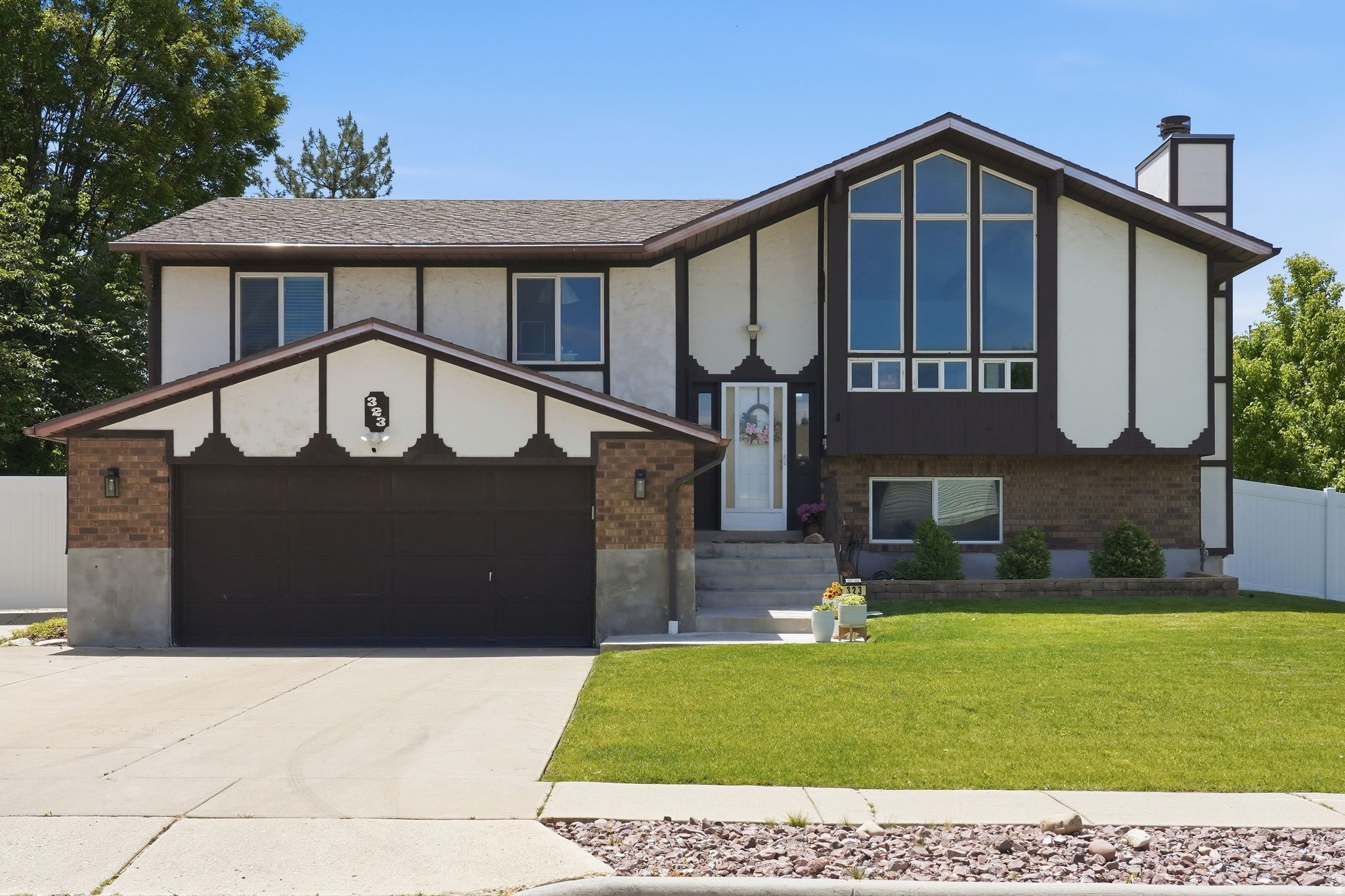 This is the one you have been waiting for! Gorgeous home with vaulted ceilings, incredible large front windows, brand new huge deck off the kitchen with amazing views! Yard is beautifully maintained with exterior yard lighting, small creek running through the backyard and firepit. Backs to a quiet 55+ community. Basement entrance and wet bar downstairs provide opportunity for a separate space. Master has private bath and double his and her closets. Solar panels included and are paid off! HVAC is all new and top of the line. Tankless water heater. Many updates throughout the home!