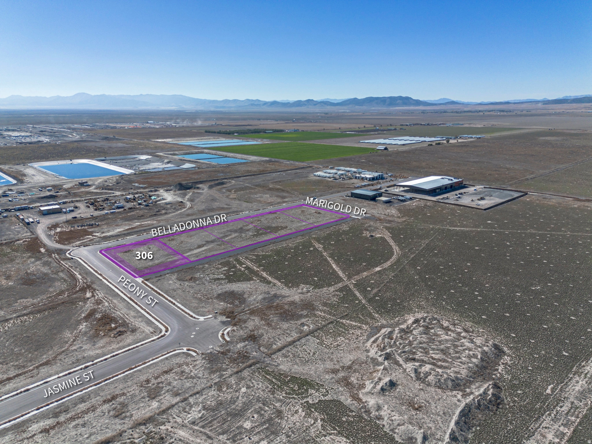 Prime .84-acre industrial lot in the Sweetwater Industrial Area of Eagle Mountain. Flat, build-ready site with power, sewer, water, and gas stubbed-ideal for immediate construction. Includes curb, gutter, and sidewalks, offering excellent access and visibility.  Perfect for light industrial, flex, or contractor use in one of Utah County's fastest-growing industrial corridors. Surrounded by active development and infrastructure expansion such as Meta and Google, this lot offers exceptional value and long-term potential.  Additional parcels available from 1.87 to 206 acres - inquire for Offering Memorandum.